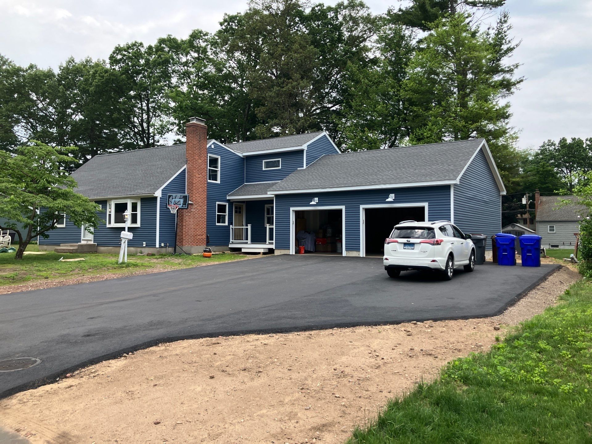 Addition: Garage, Kitchen & En-Suite by Ace Carpentry LLC 