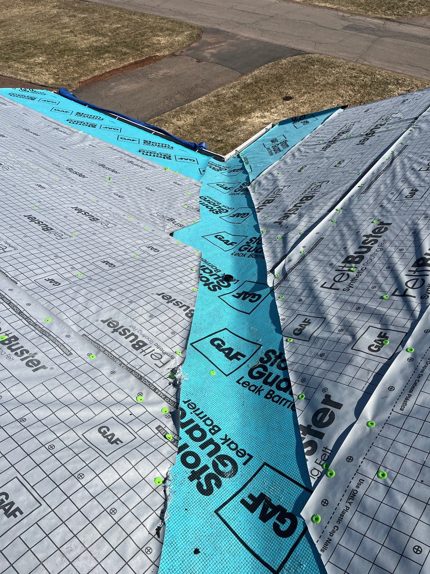 Residential Roofing Installation using Asphalt GAF HDZ in Charcoal by Artisan Roofing & Home Improvements Inc.