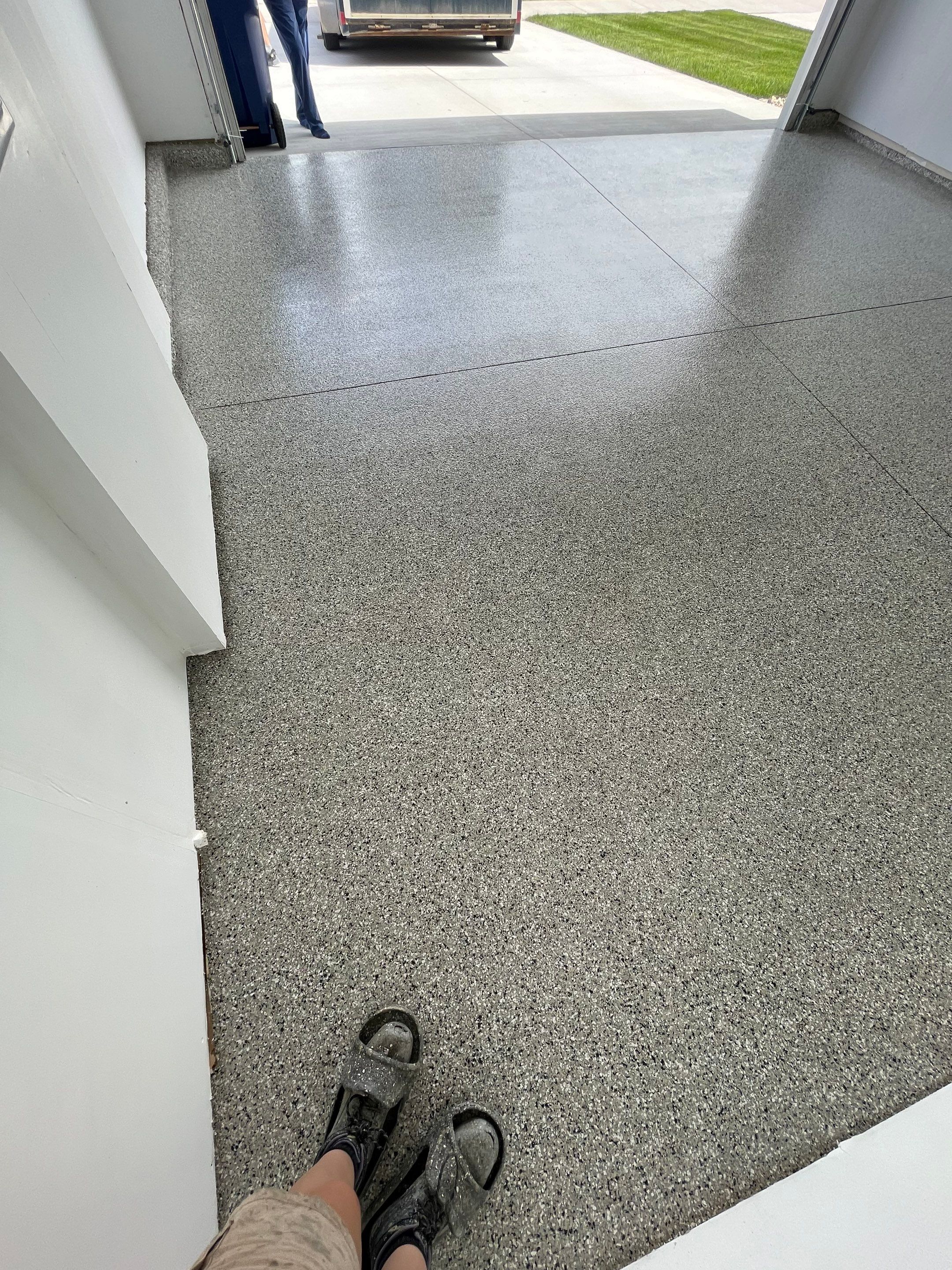 Sioux Falls Garage Floor Transformation with Cabin Fever Decorative Chips by Select Painting, Coatings & Garage Cabinets