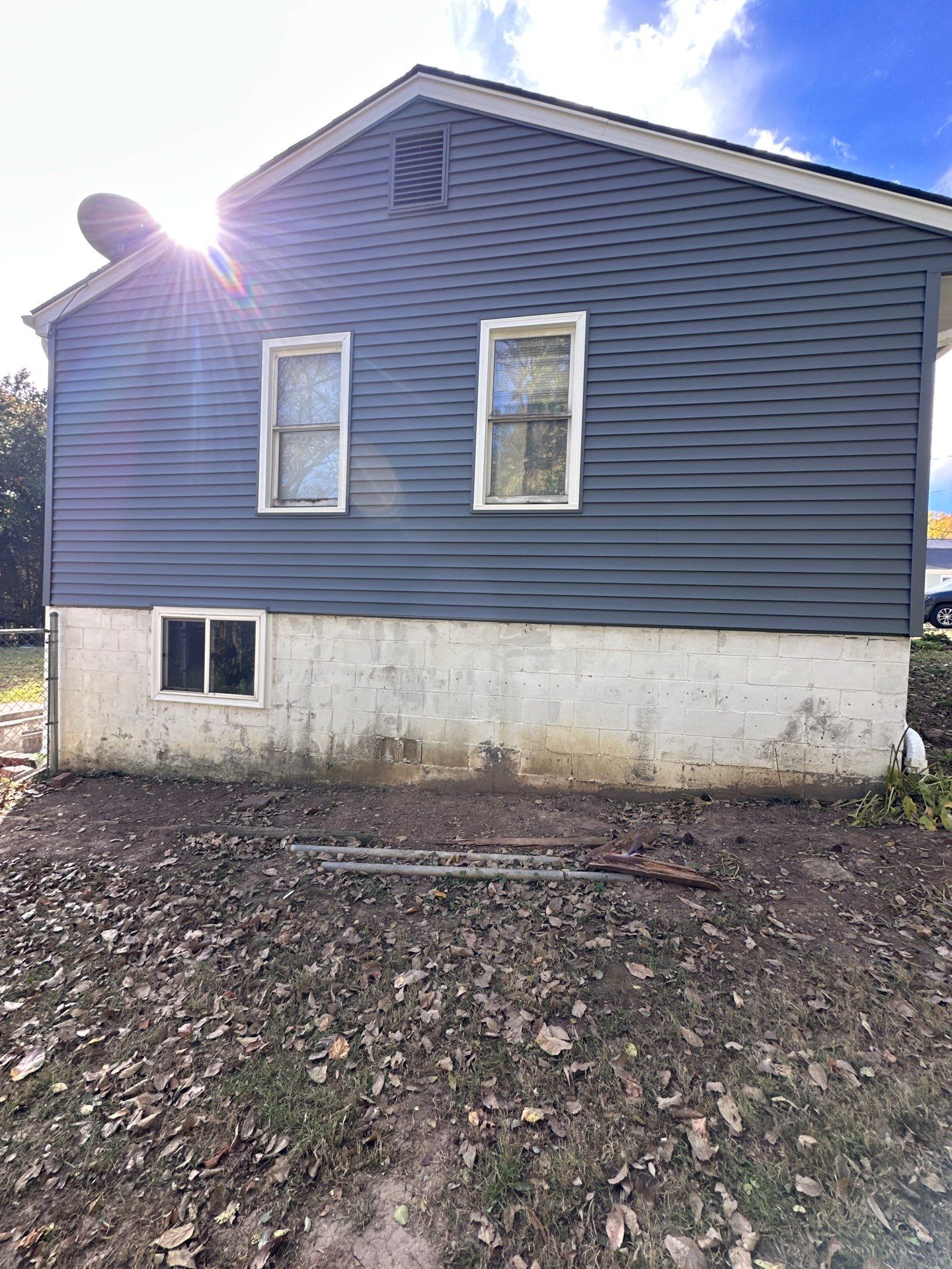 Feeling Blue in Weston Mo - Time for a Makeover by EEC Windows, Siding & Roofing