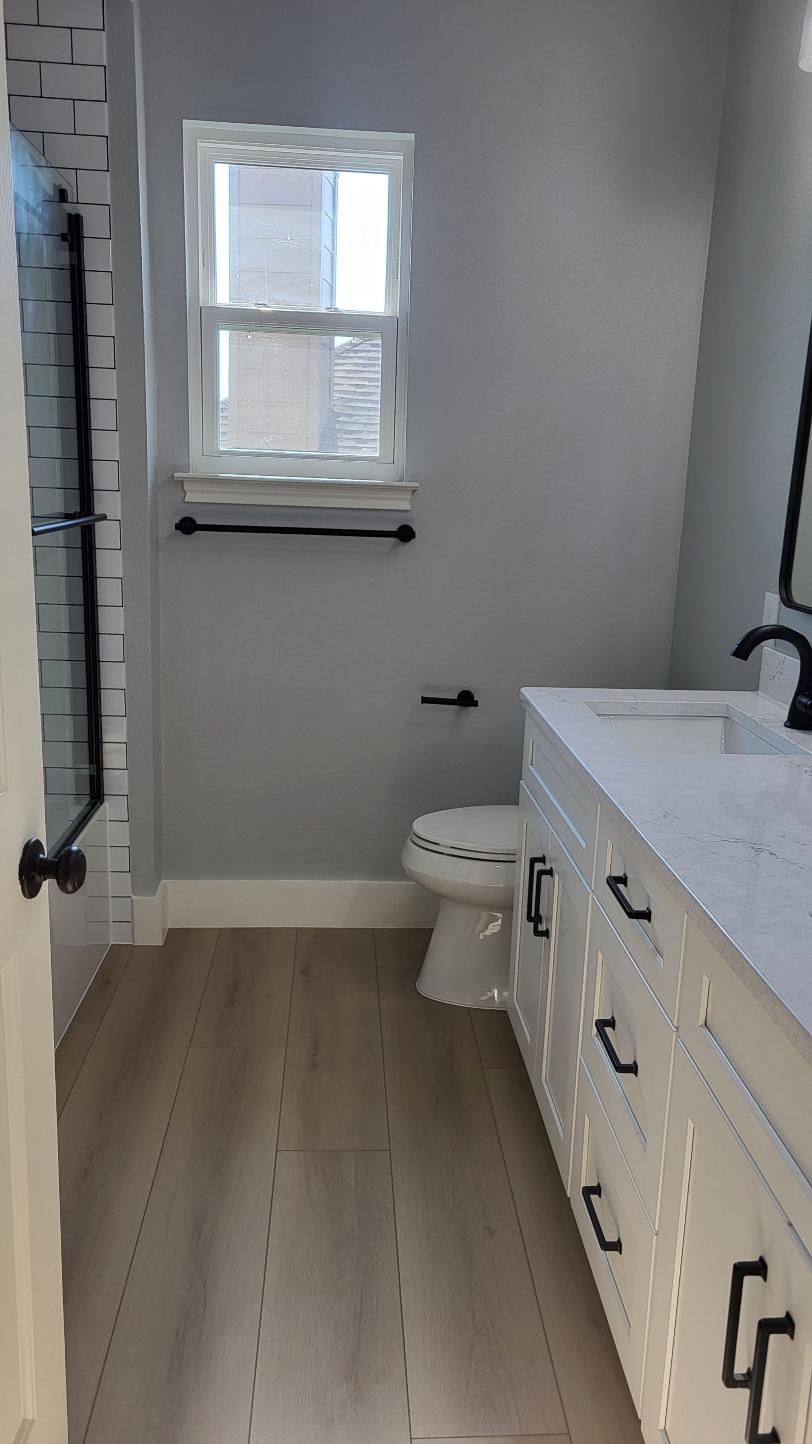 Stone Oak Bathroom Refresh with Modern Subway Tile Before and After by Legacy Bath and Kitchen