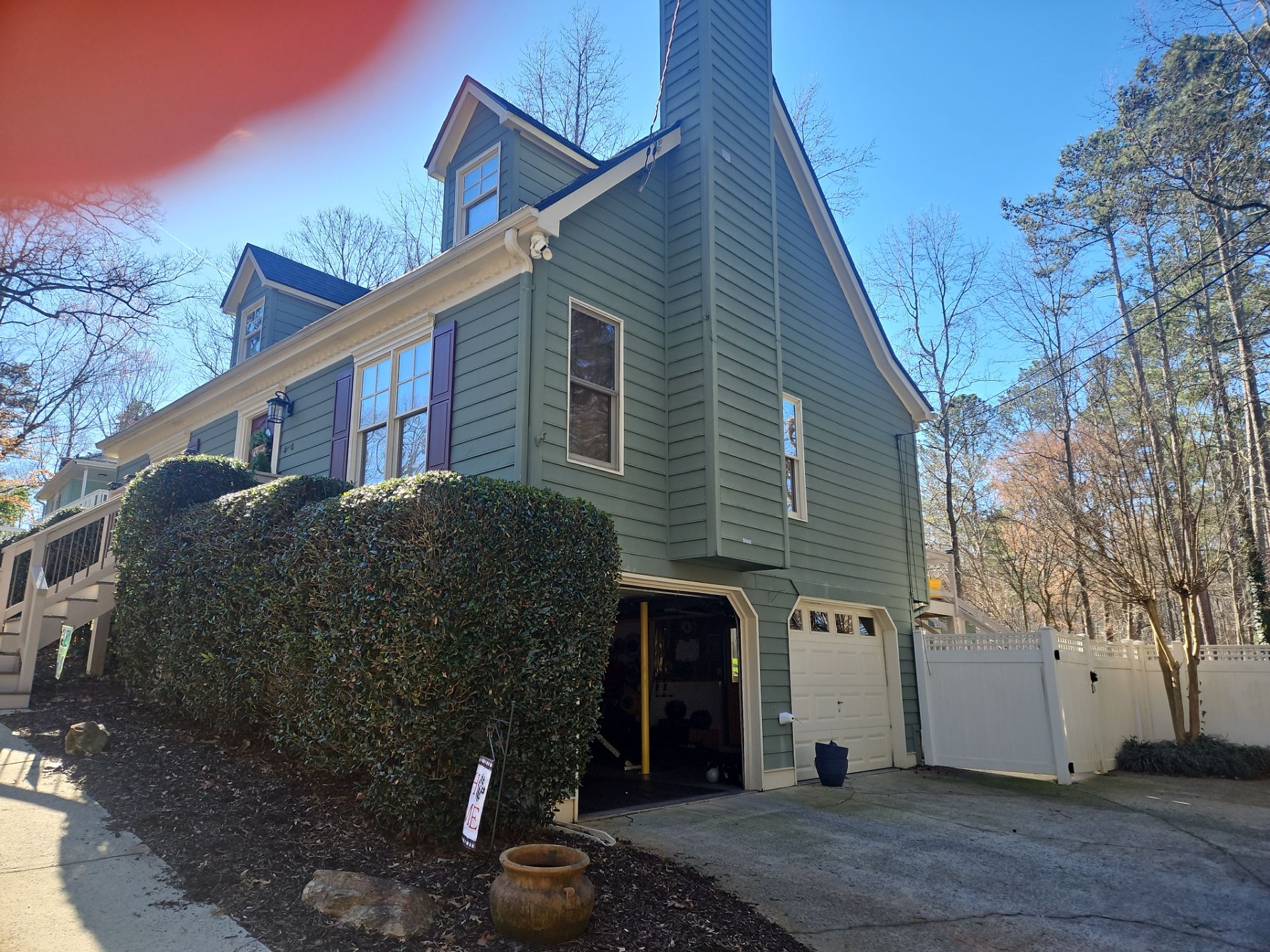 James Hardie Siding Install, Rotten Wood and Gutter Replacement and Exterior Painting by Nelson Exteriors 