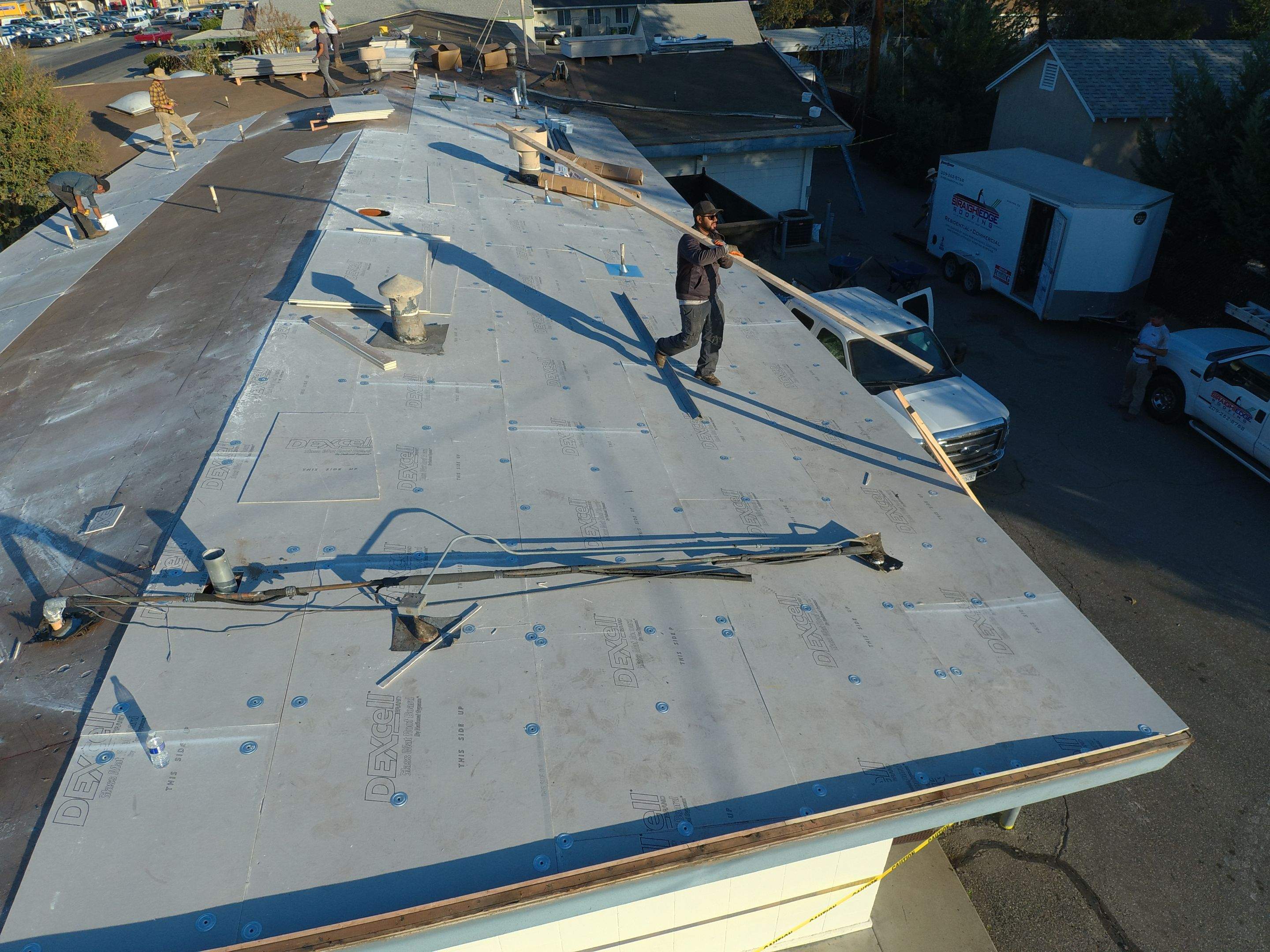 Spray foam and coatings using Conklin Benchmark/PUMA XL coatings and spray foam by Straight Edge Roofing Inc