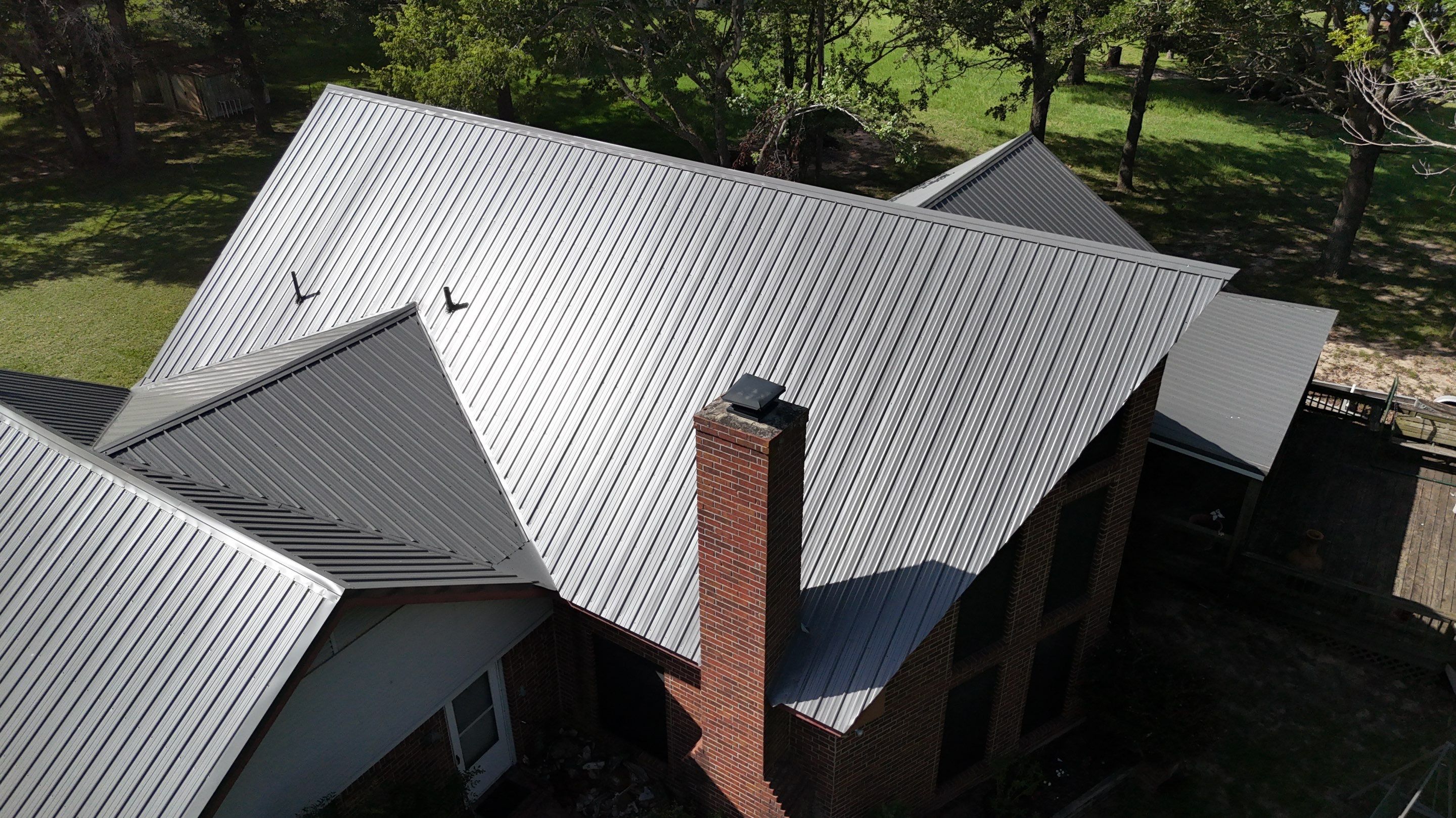 Charcoal Metal Roof at Lake Limestone, Tx by DT Roofing - Seth Wells