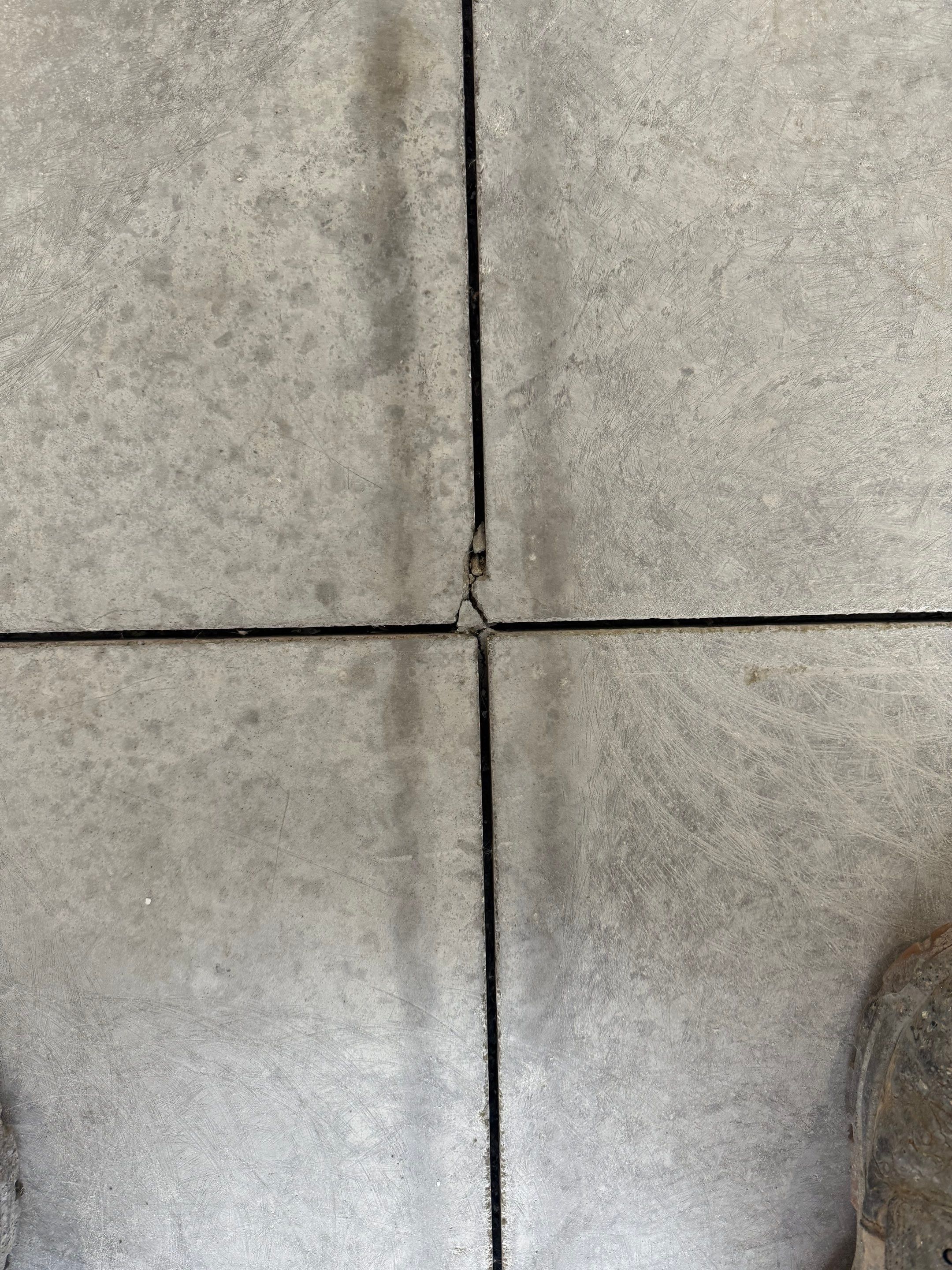 High-Gloss Epoxy Flake Garage Floor Coating in Brandon by Select Painting, Coatings & Garage Cabinets