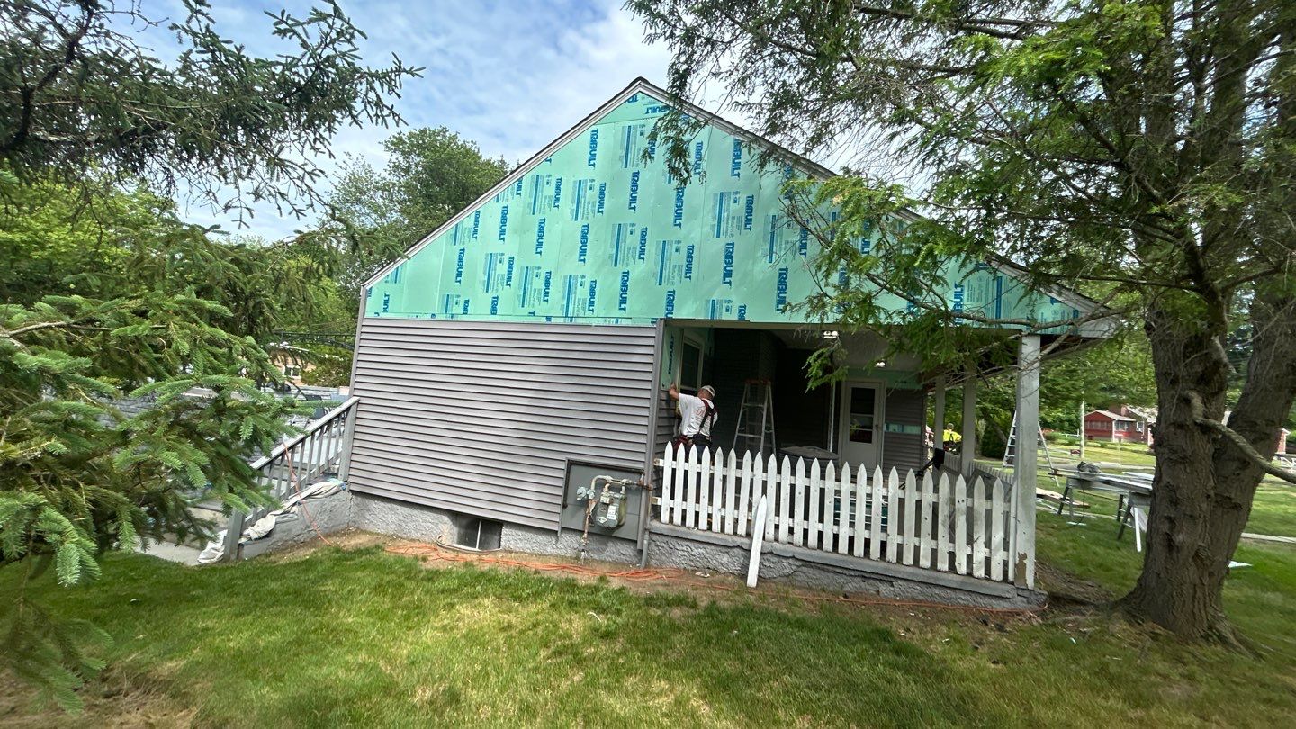 Siding Renovation with Cert Monogram D/4 x 12'6" Clapboard, Driftwood Blend by DiGiorgi Roofing and Siding Inc