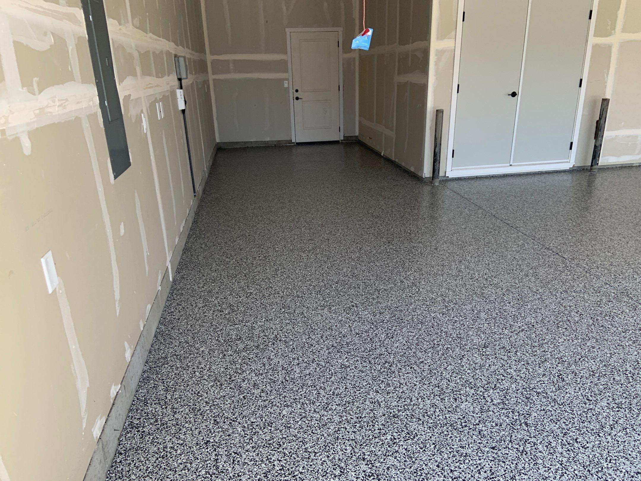 Garage Transformation using Domino by Croc Coatings, LLC