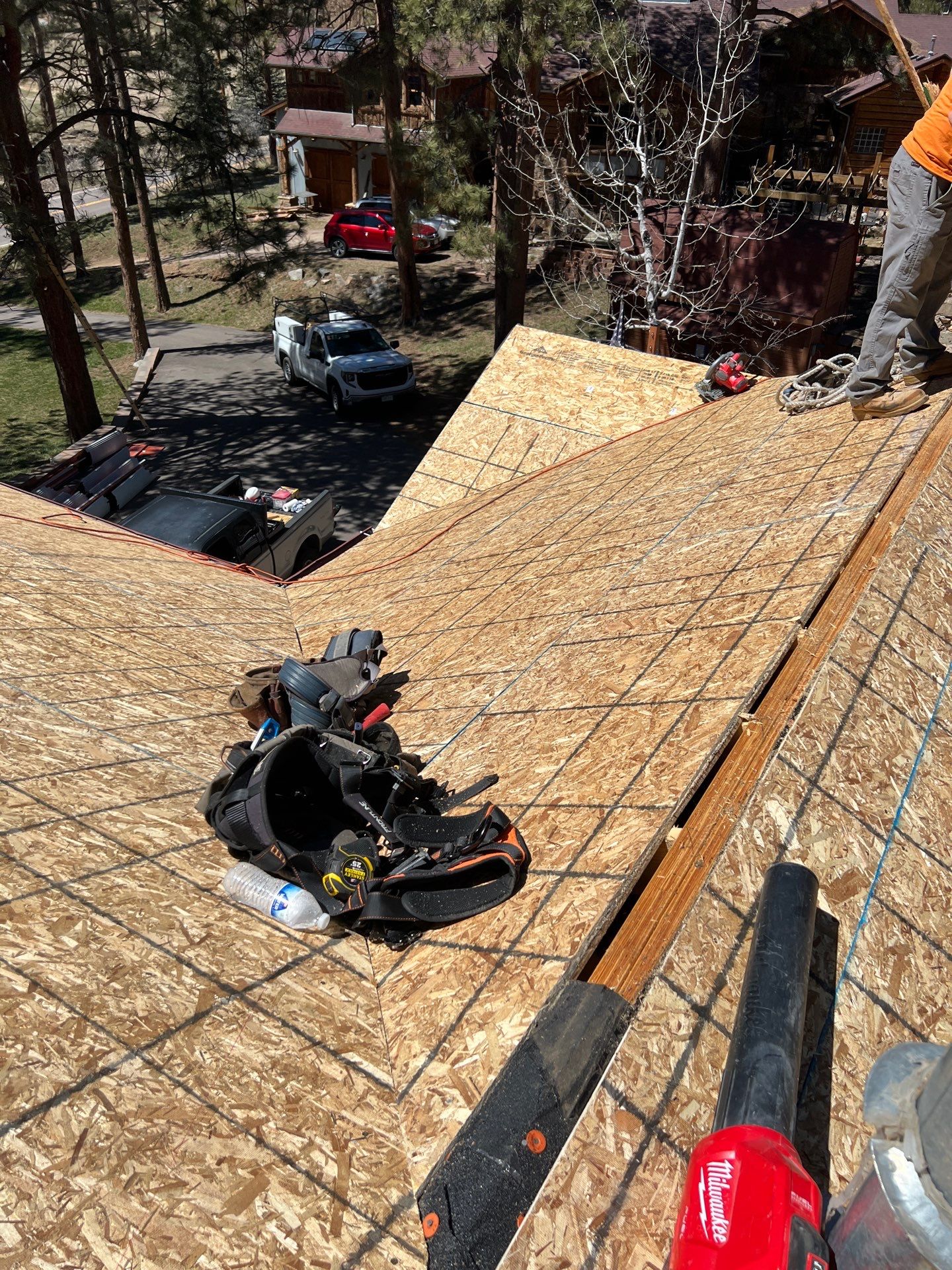 Residential Roofing Installation using Standing Seam Metal by Blue Peaks Roofing LLC 