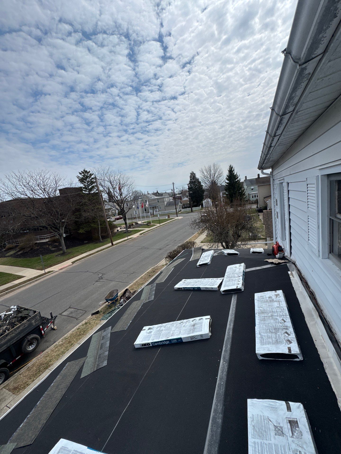 Onyx Black Shingles by Reimagine Roofing