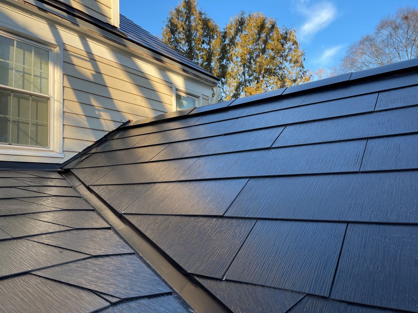 Tesla Solar Roof  by American Home Contractors