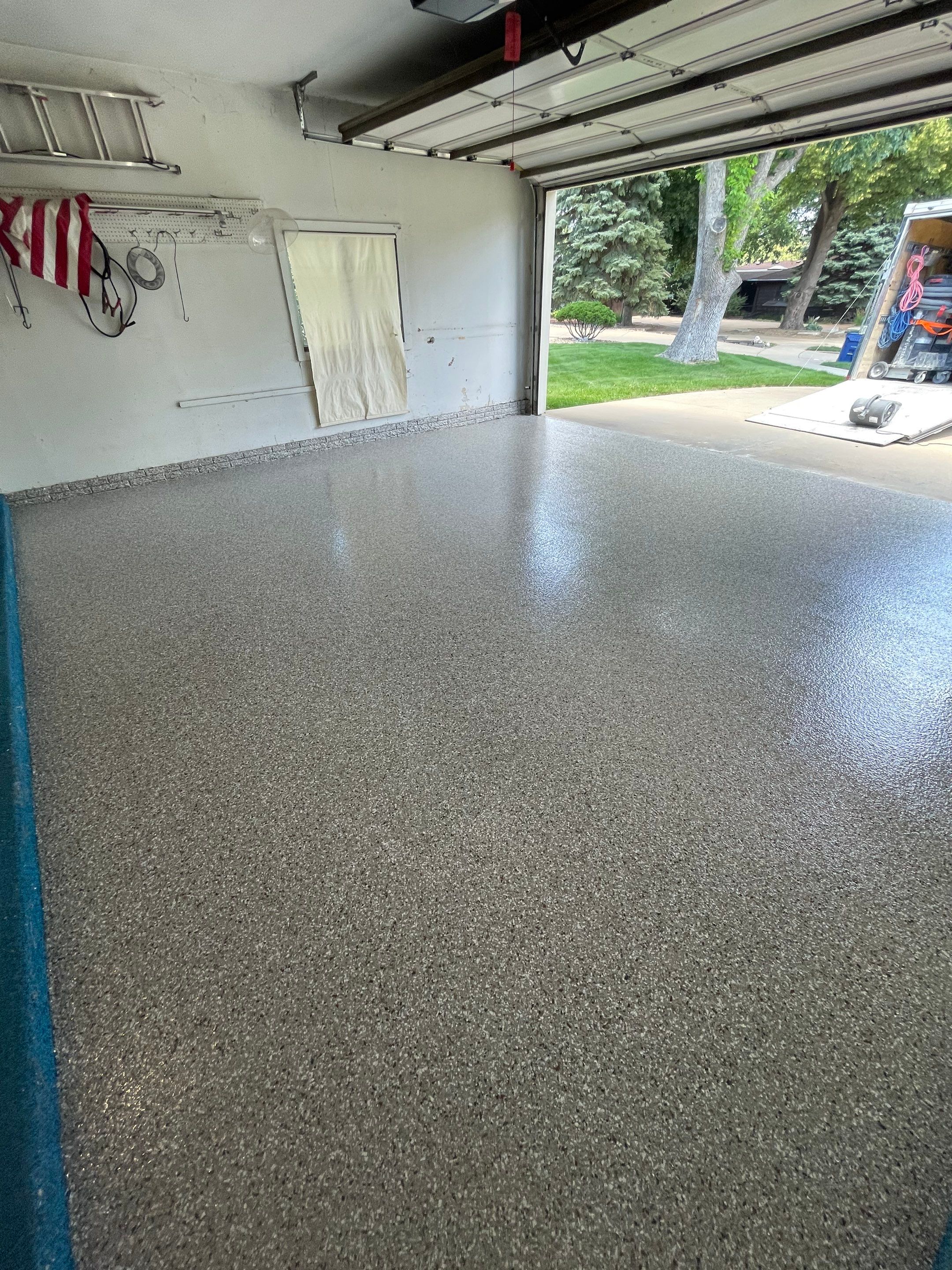 Custom Creekbed Garage Floor Coating in Sioux Falls by Select Painting, Coatings & Garage Cabinets
