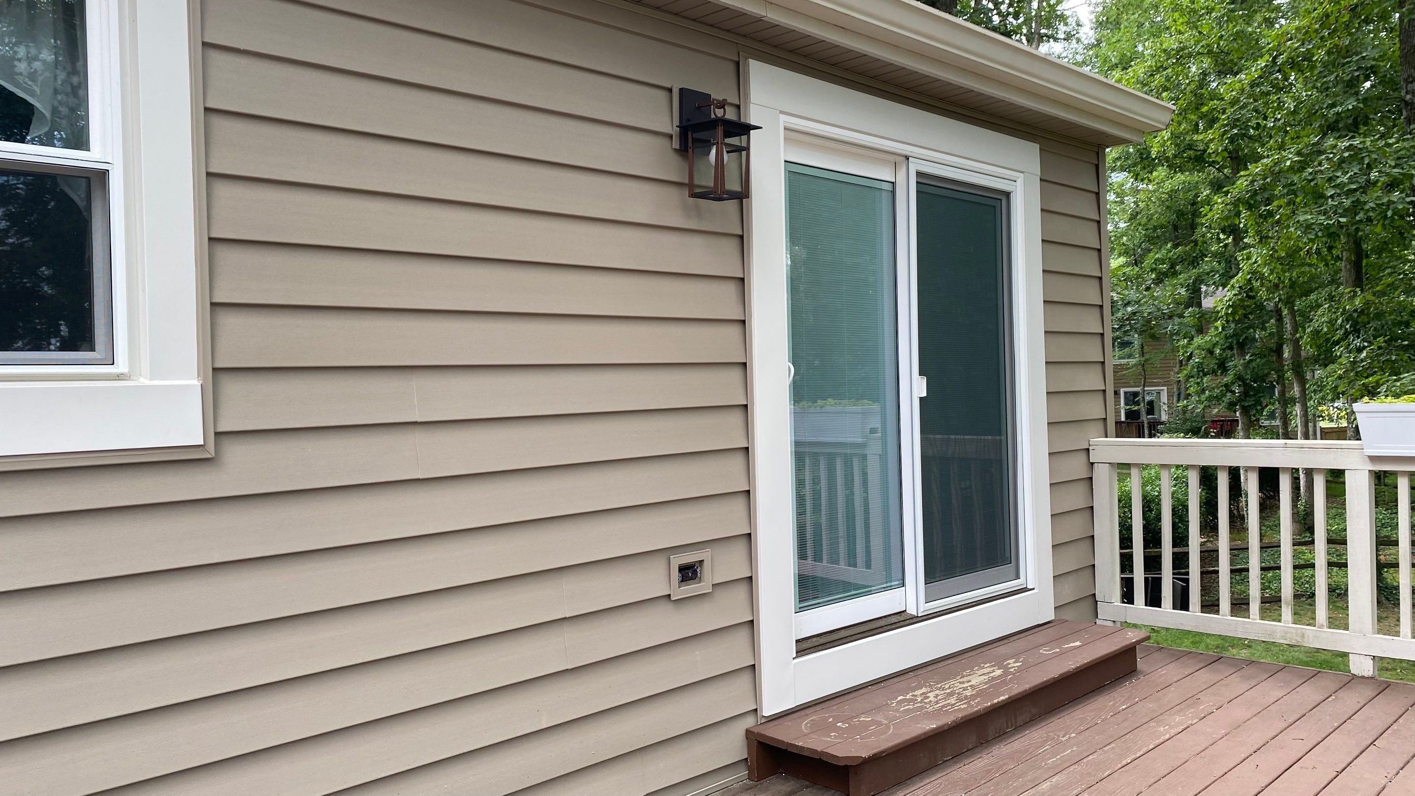 Mastic Siding + Interstate Windows by American Home Contractors