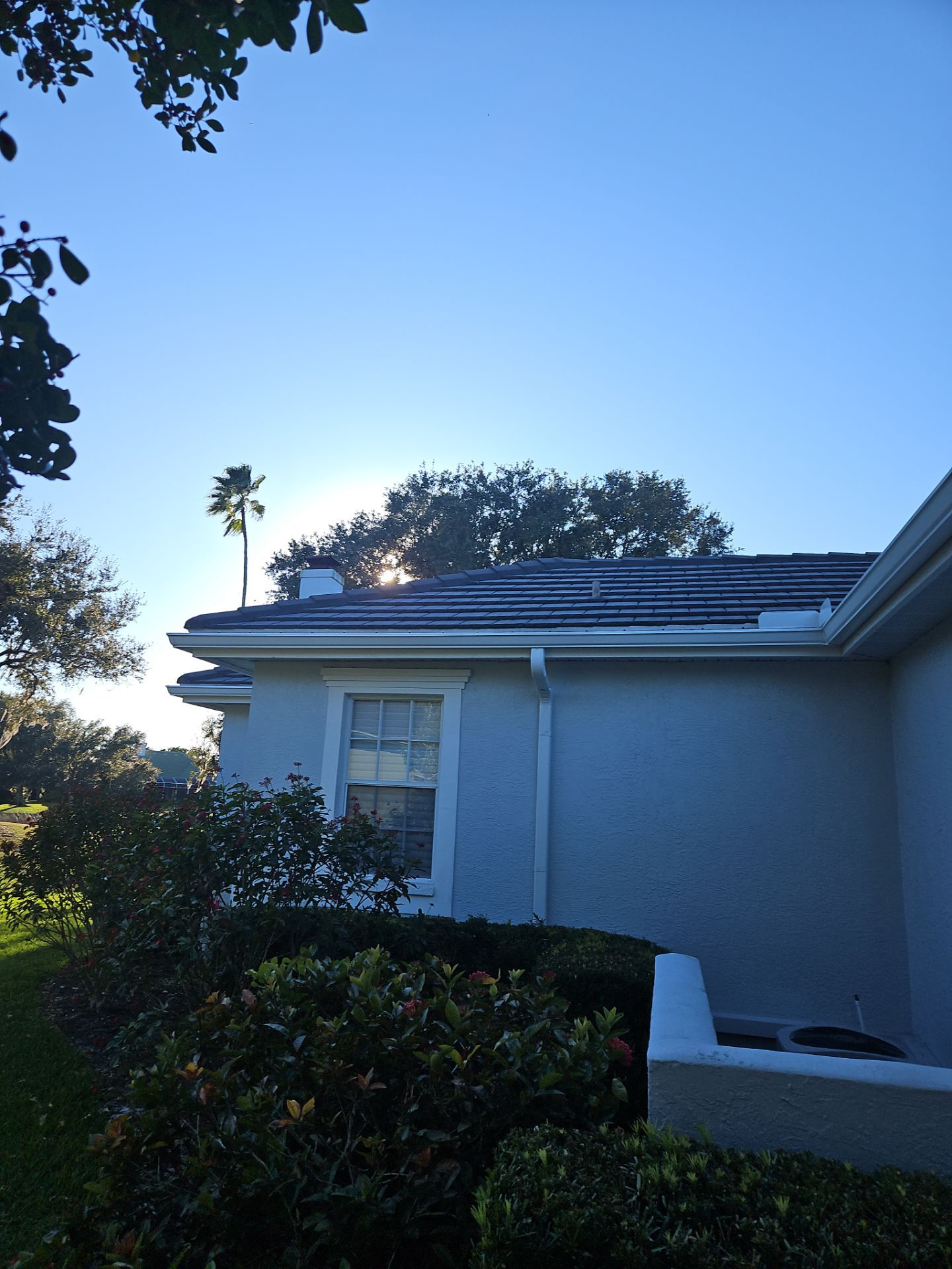 White Down Spouts using downspouts and White Seamless Gutters in Sarasota FL by Gutter Professors