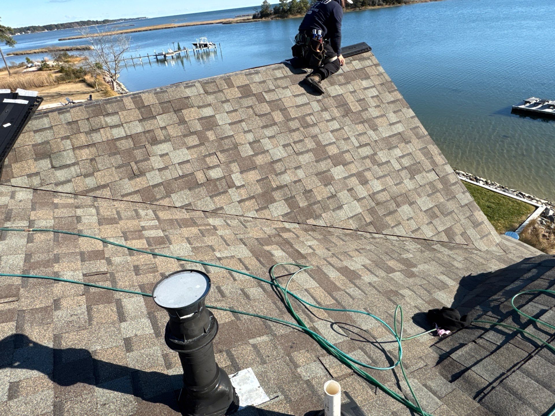 Waterfront Roof Replacement in White Stone, VA by Cade Construction
