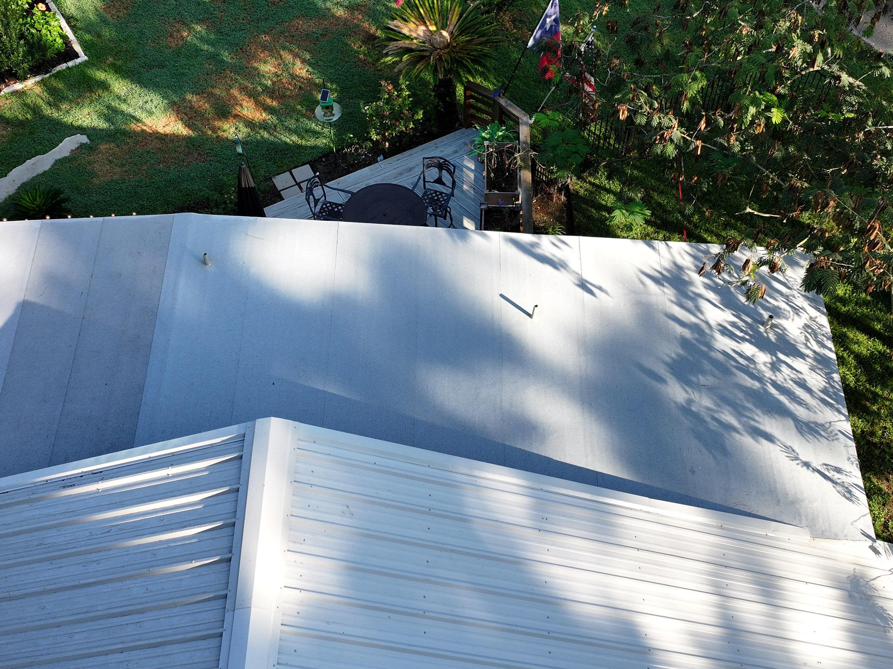 White Standing Seam Metal Roof Replacement in Willis, Texas by Abbott Roofing Company