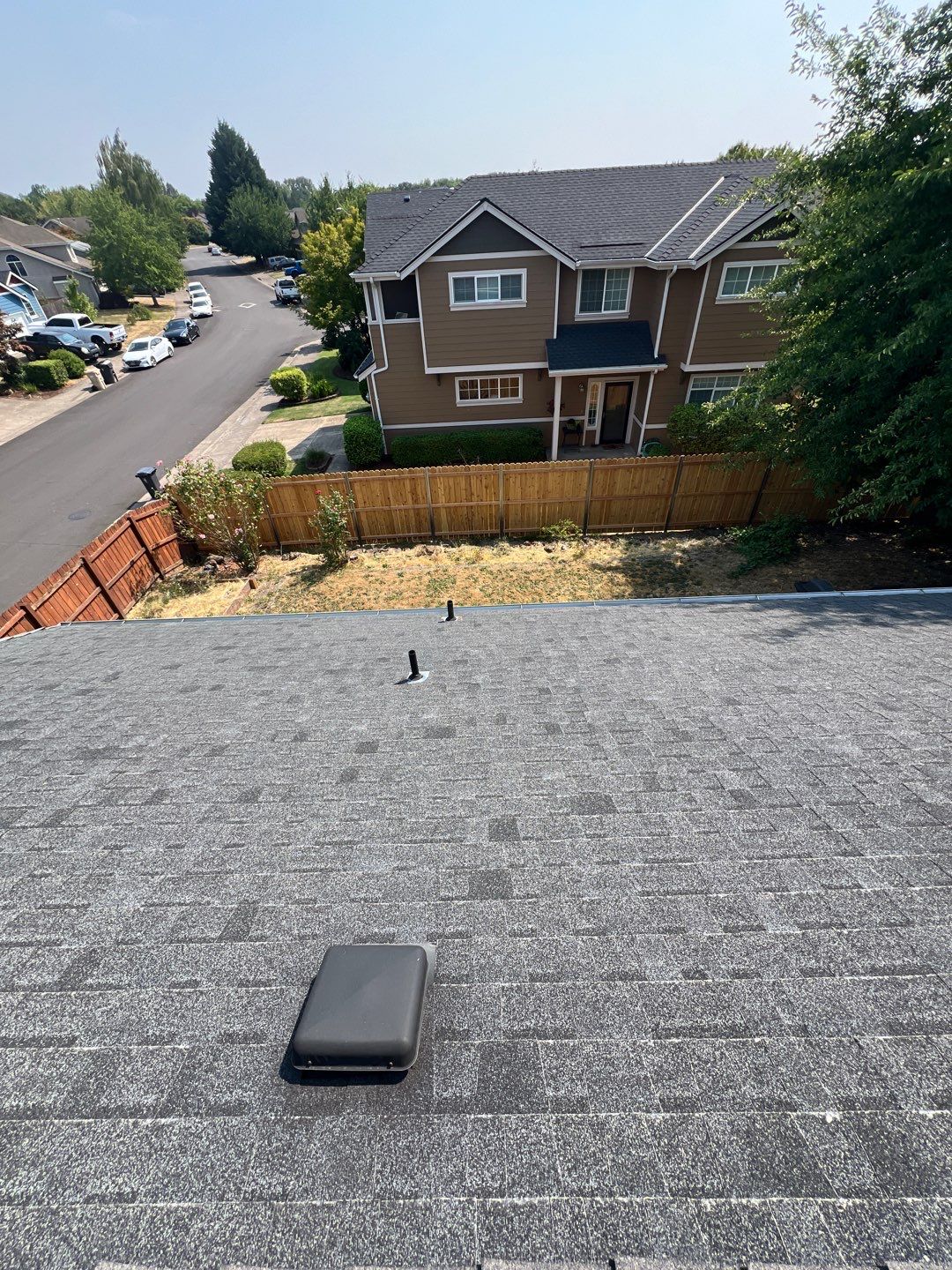 Residential Roofing Installation using IKO Dynasty (Color: Granite Black) by Orezona Building & Roofing Company, Inc.