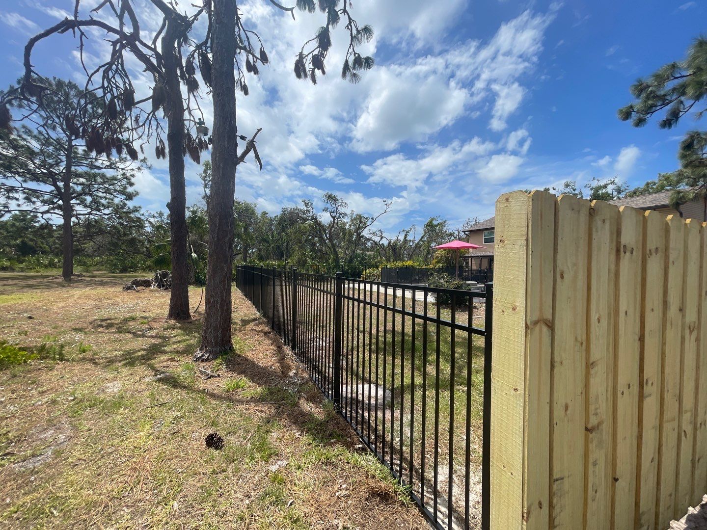 Black Aluminum 3 Rail Fence and Treated Wood Board on Board Privacy Fence  by Asap fence and gates, LLC