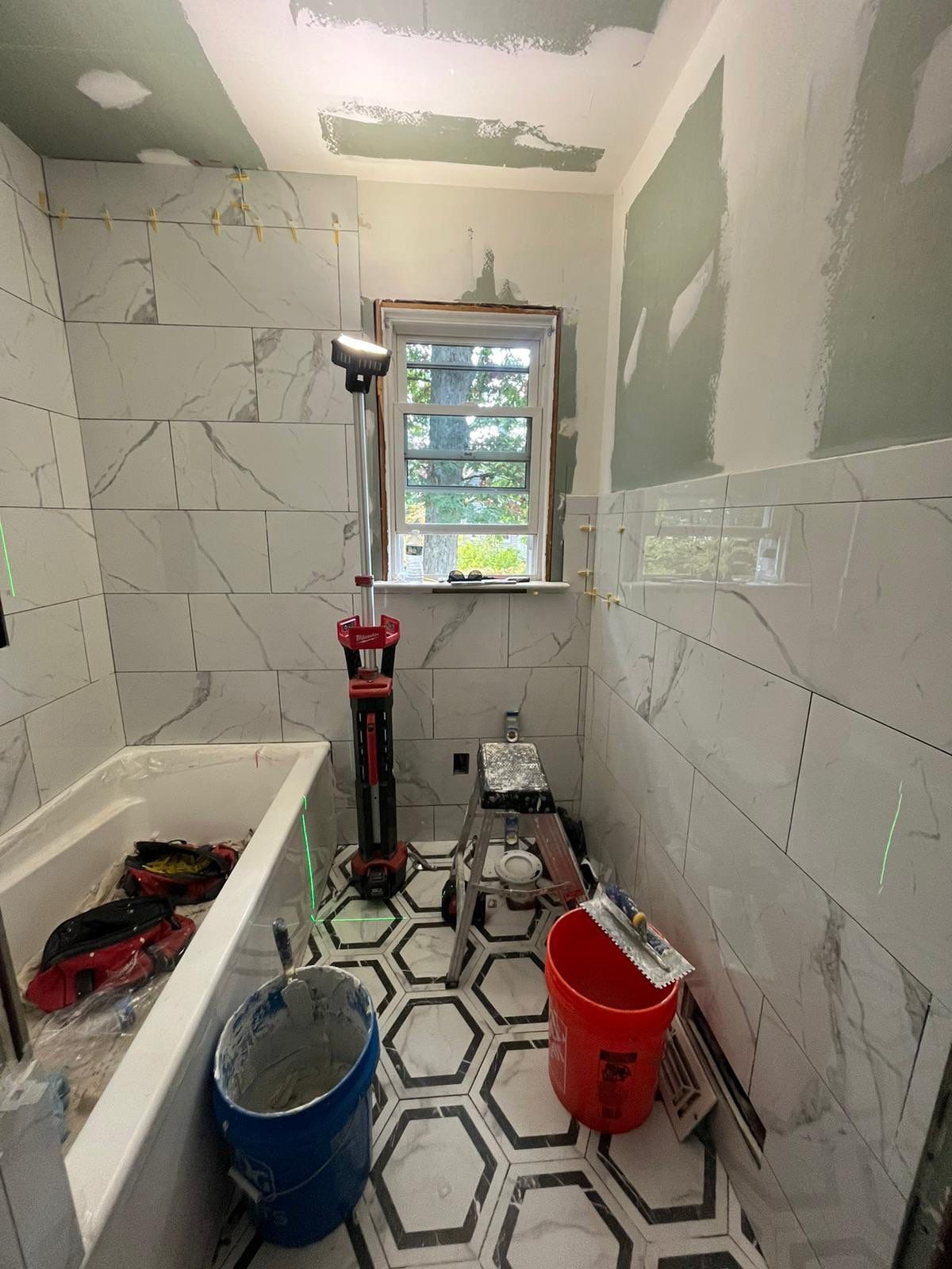 Bathroom Remodel using Tile by Home Concepts Construction