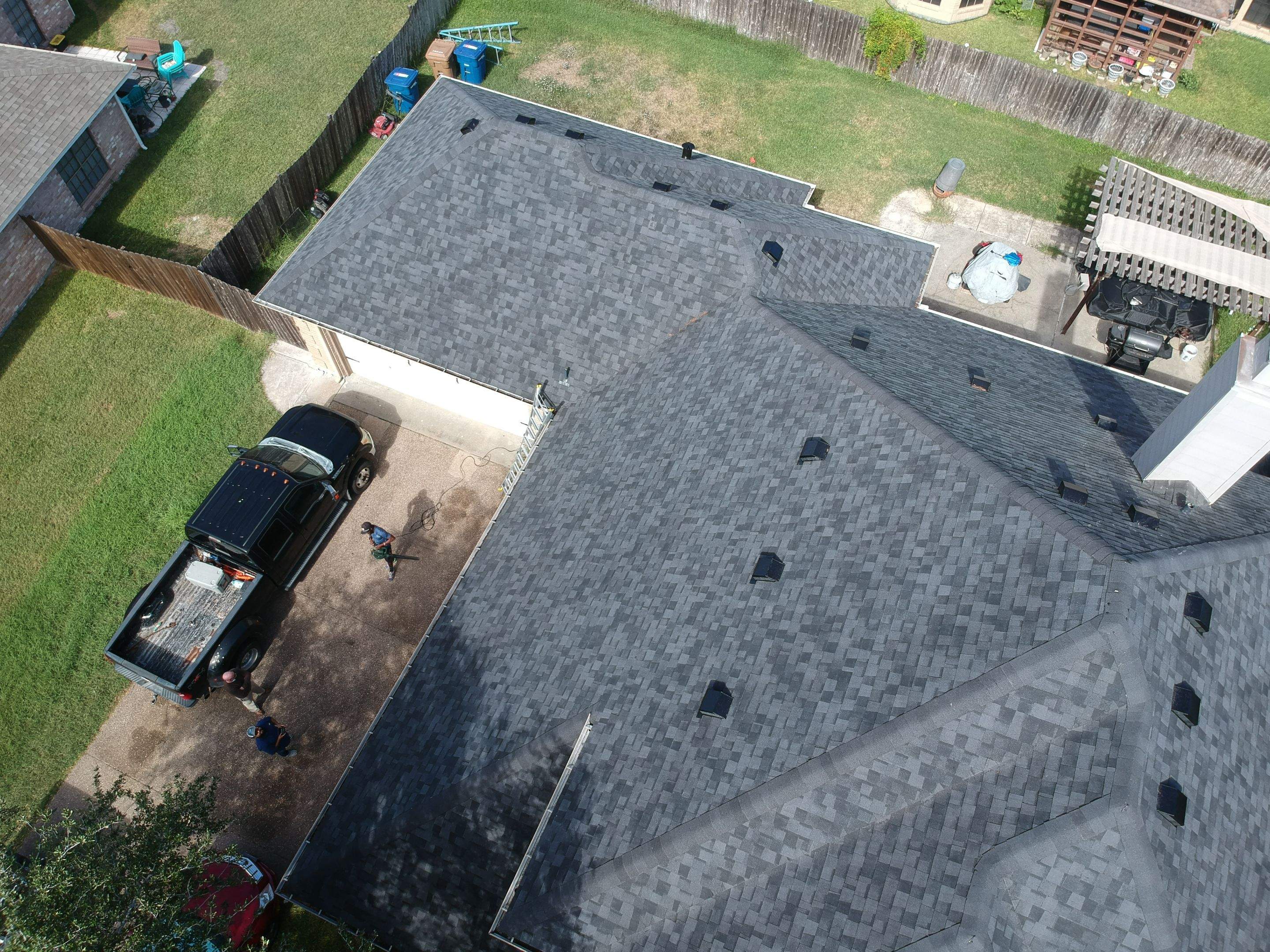Residential Roofing Installation using Certainteed Landmark Moire Black by Galvan Roofing and Construction