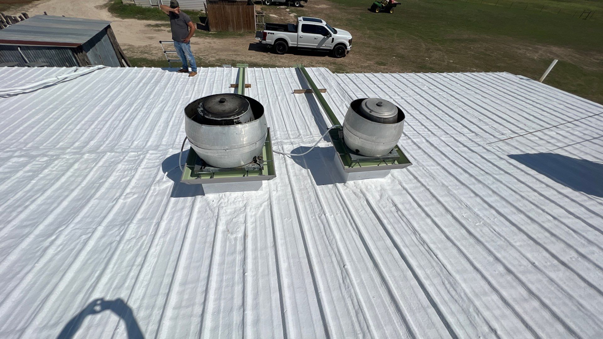 Commercial Roofing Repair using TRP #924 Eterna-Sil Premium Silicone Roof Coating by Harvey Roofing & Construction