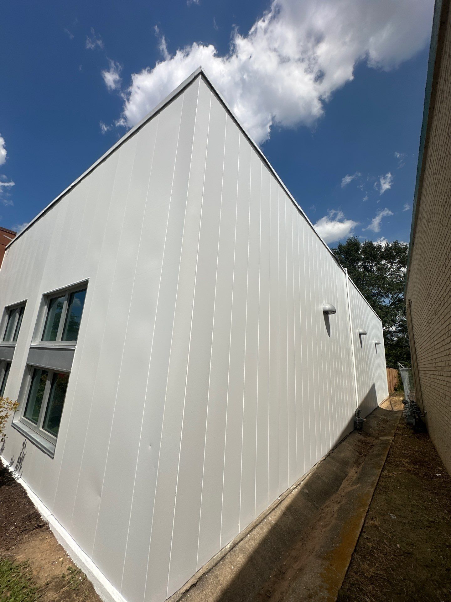 Commercial Exterior Painting for Greenville Parking Services Facility by Painter1