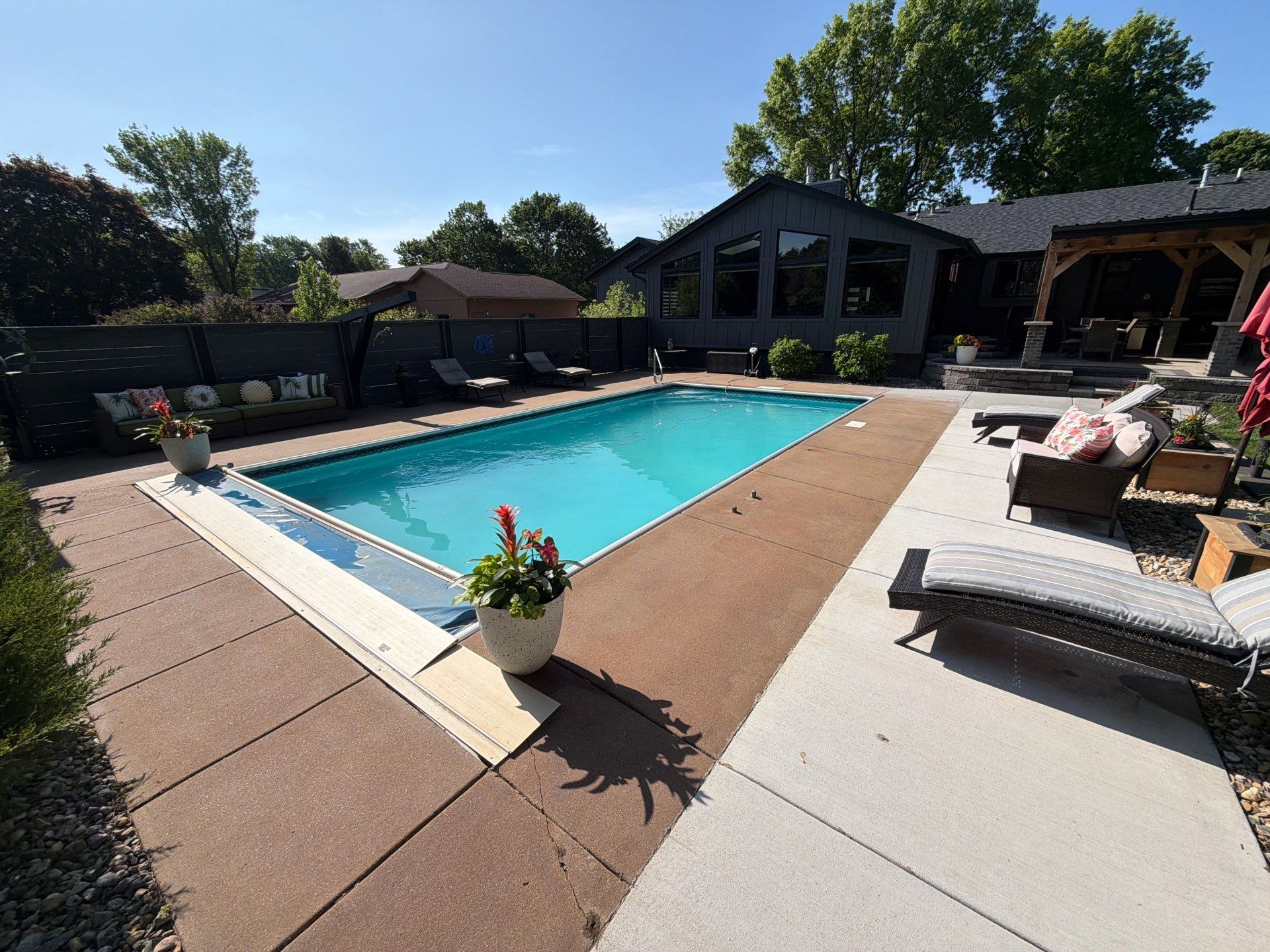 Garage Floor and Textured Pool Deck Coating in Sioux Falls by Select Painting, Coatings & Garage Cabinets