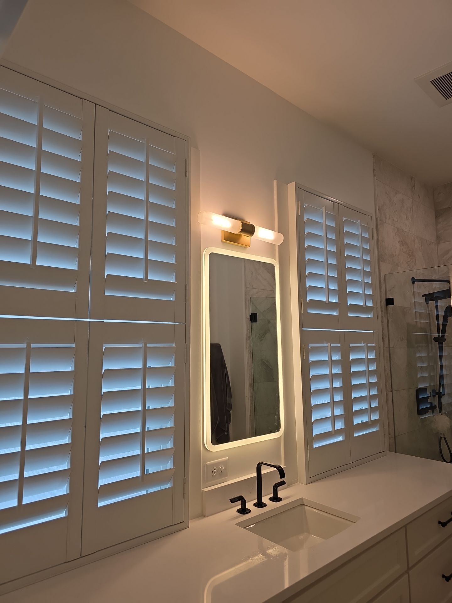 Double hung shutters  by Southern Traditions Window Fashions
