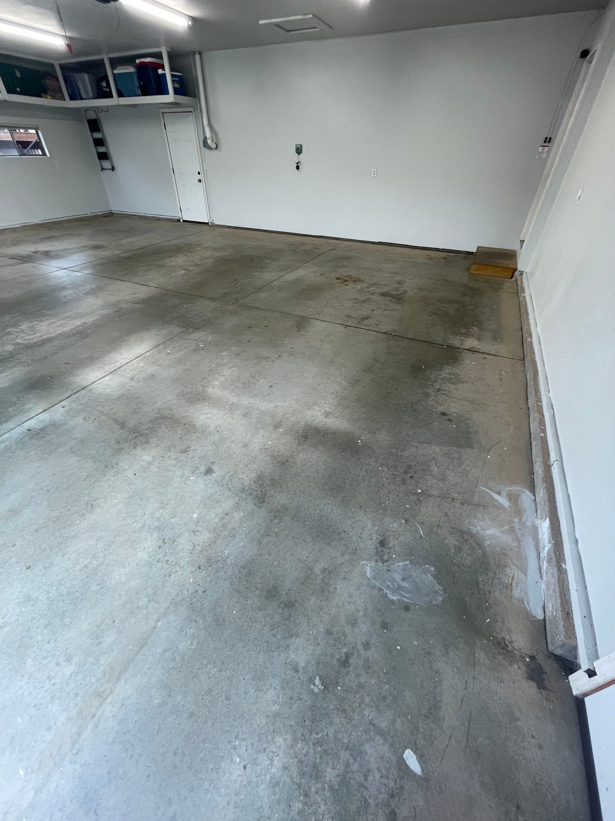 Multi-Car Garage Floor Coating and Crack Repair in Tea by Select Painting, Coatings & Garage Cabinets