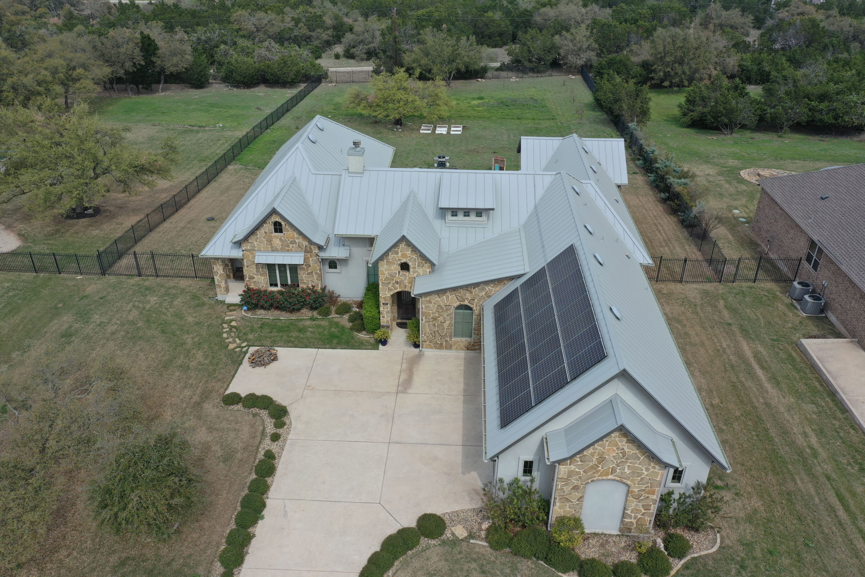 Residential Roof Replacement using 24 GA Double-Lock - Galvalume by Action Exteriors Austin