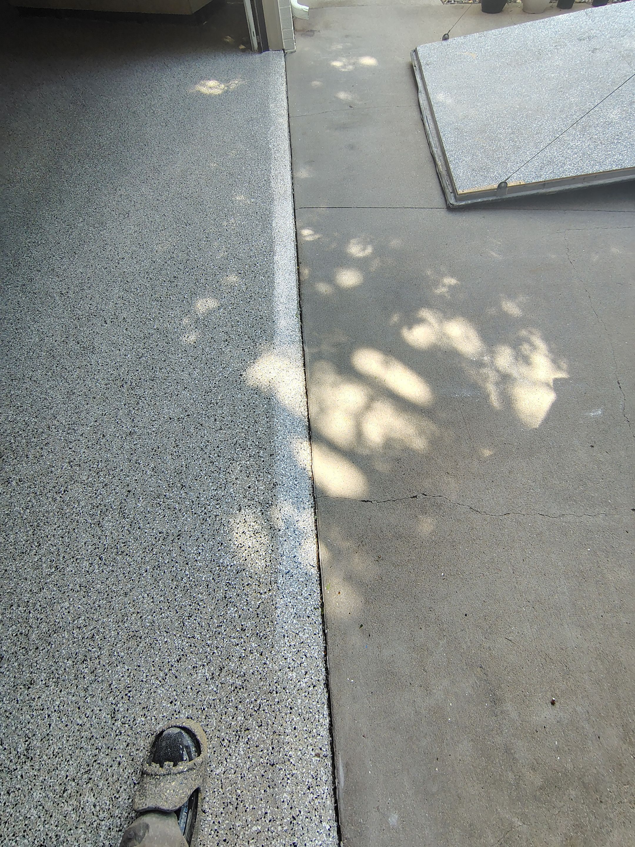 Multi-Fleck Epoxy Garage Floor Coating in Dell Rapids by Select Painting, Coatings & Garage Cabinets