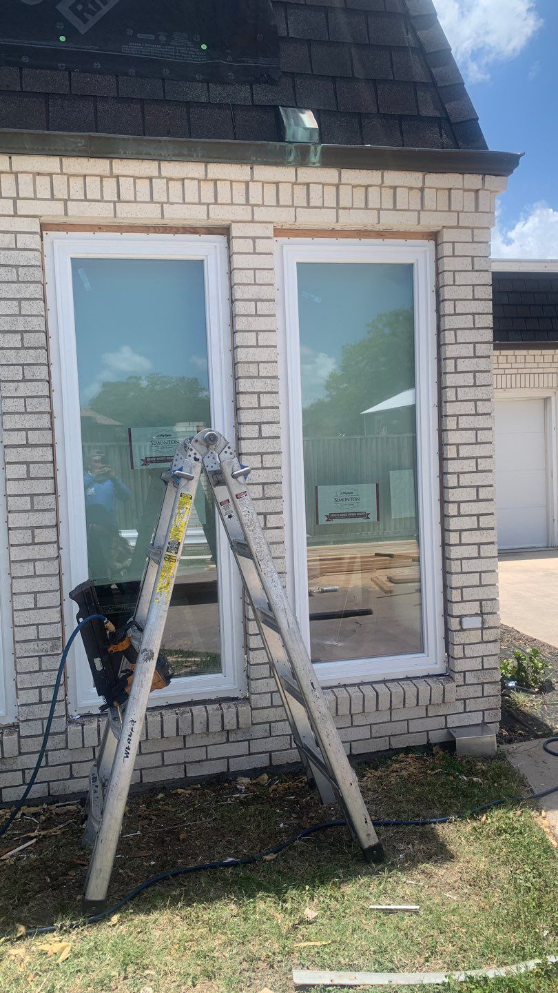 Mansard Charm by Bayfront Roofing and Construction