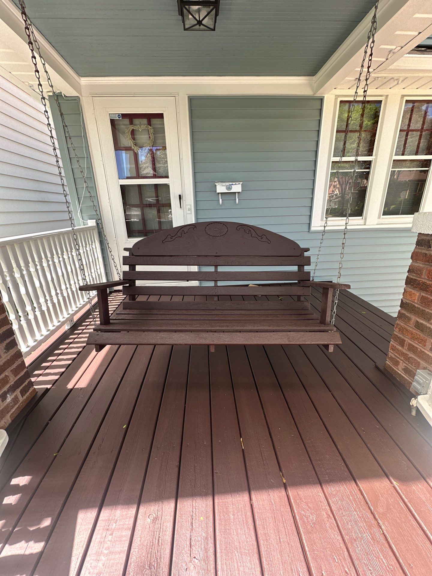 Exterior Porch Restoration and Privacy Fence Staining in Wauwatosa by OCS Contracting Services