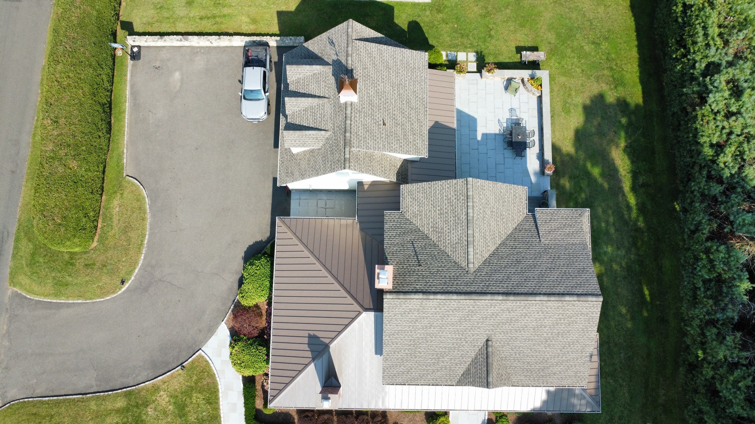 Asphalt & Standing Seam Metal Roof Replacement  by Lecla Home Improvements and Roofing INC