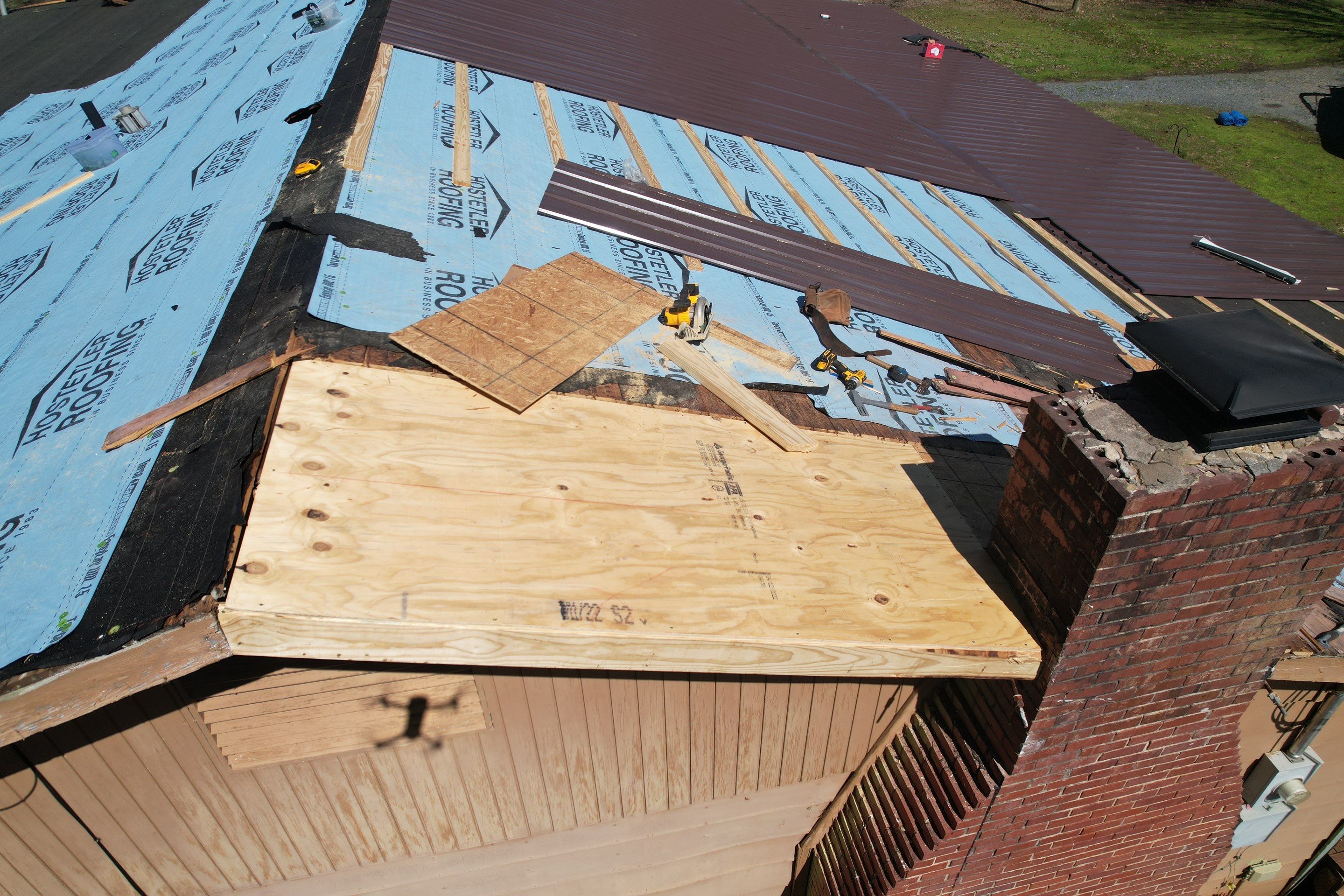 Residential Roofing Installation using 29 Gauge Colored Metal by Hostetler Roofing