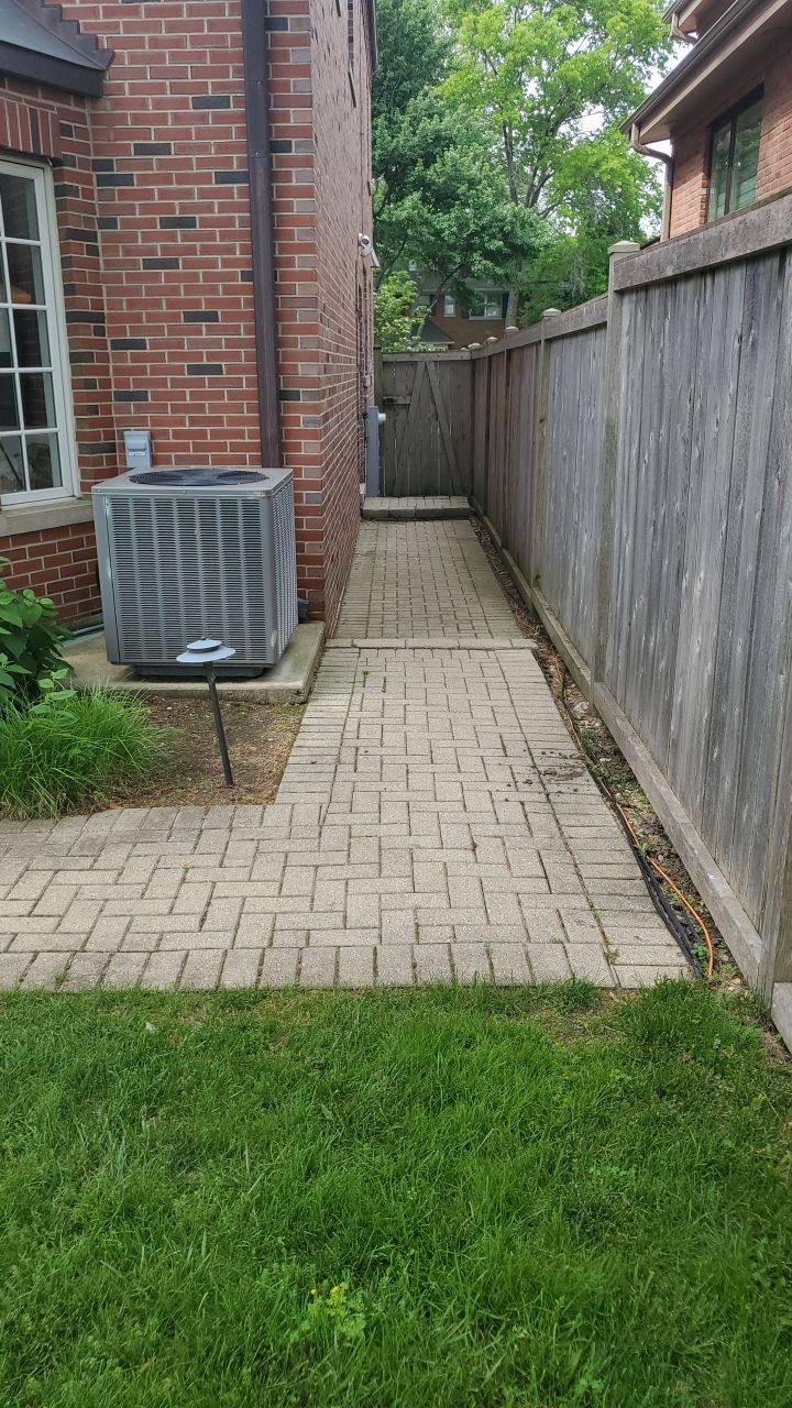 Brick patio repair, clean sand and seal by Northern Power Washing LLC.