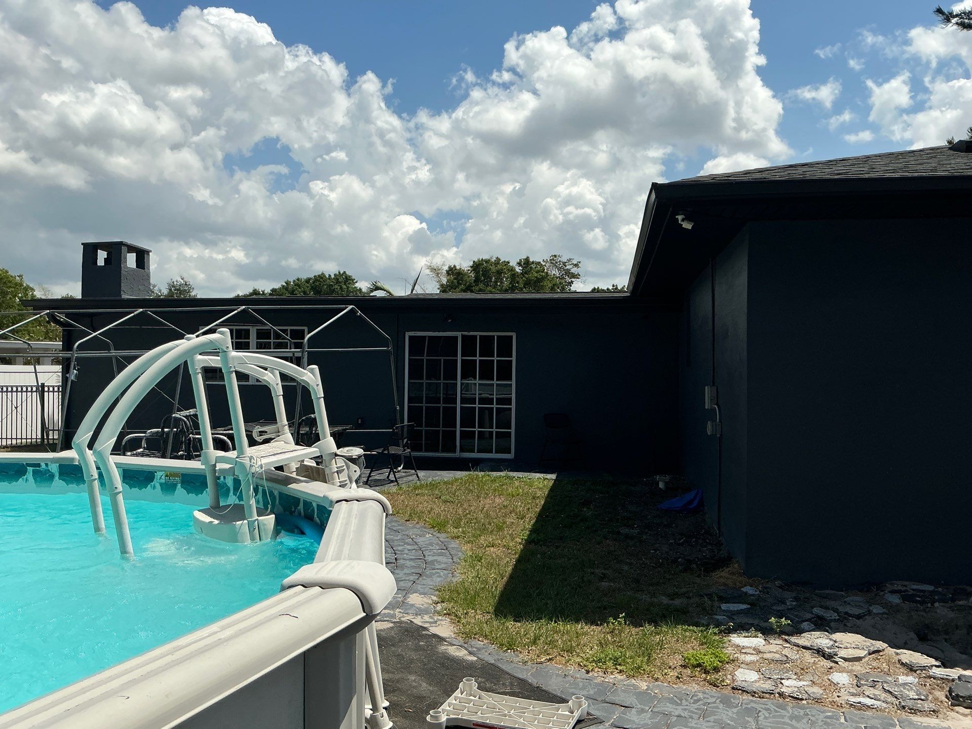 Black 7-Inch Gutters with Matching Downspouts in Fort Myers FL by Gutter Professor by Gutter Professors