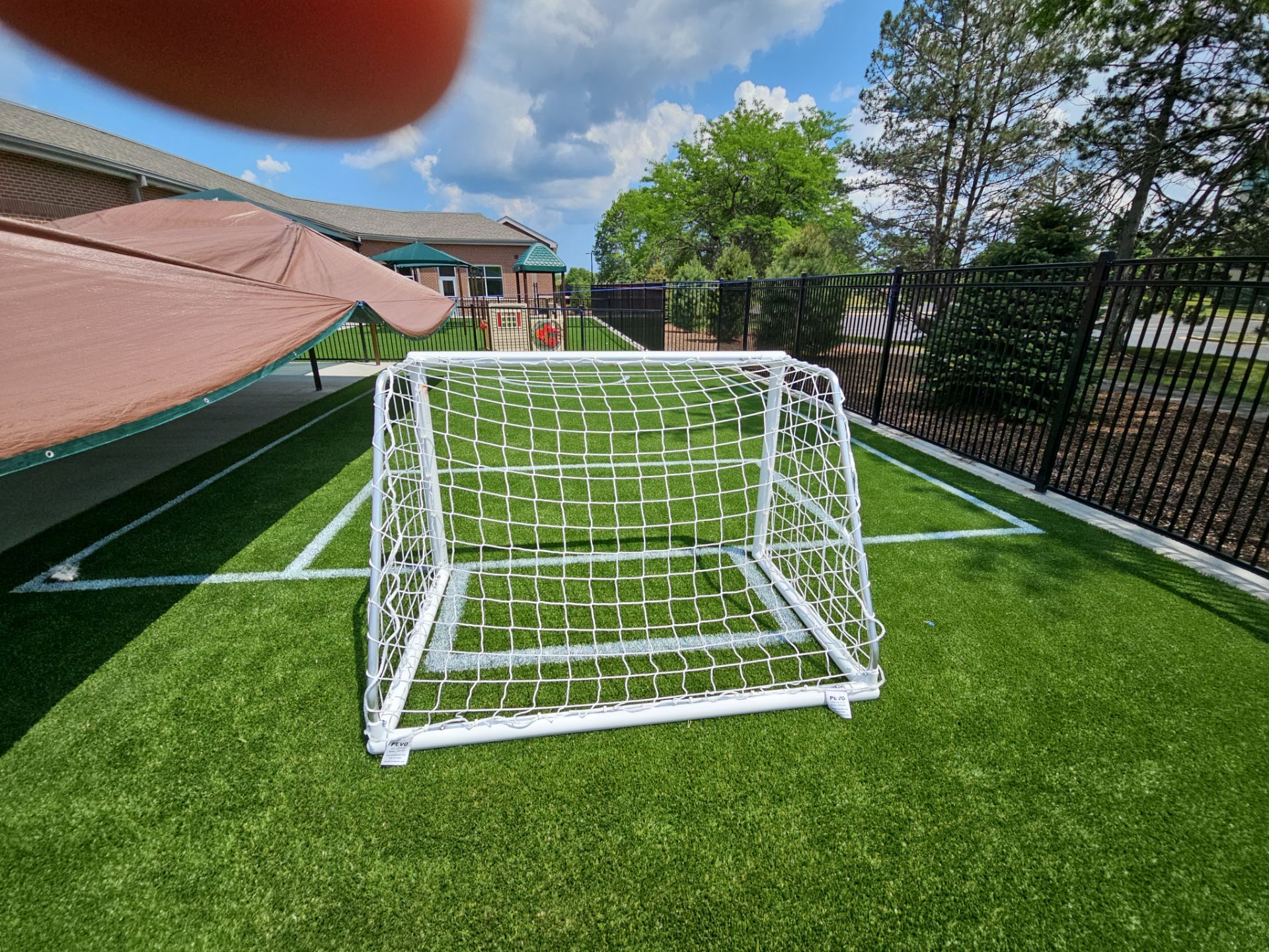 KinderCare of Lincolnshire Commercial Playground Turf Installation by Southwest Greens Midwest