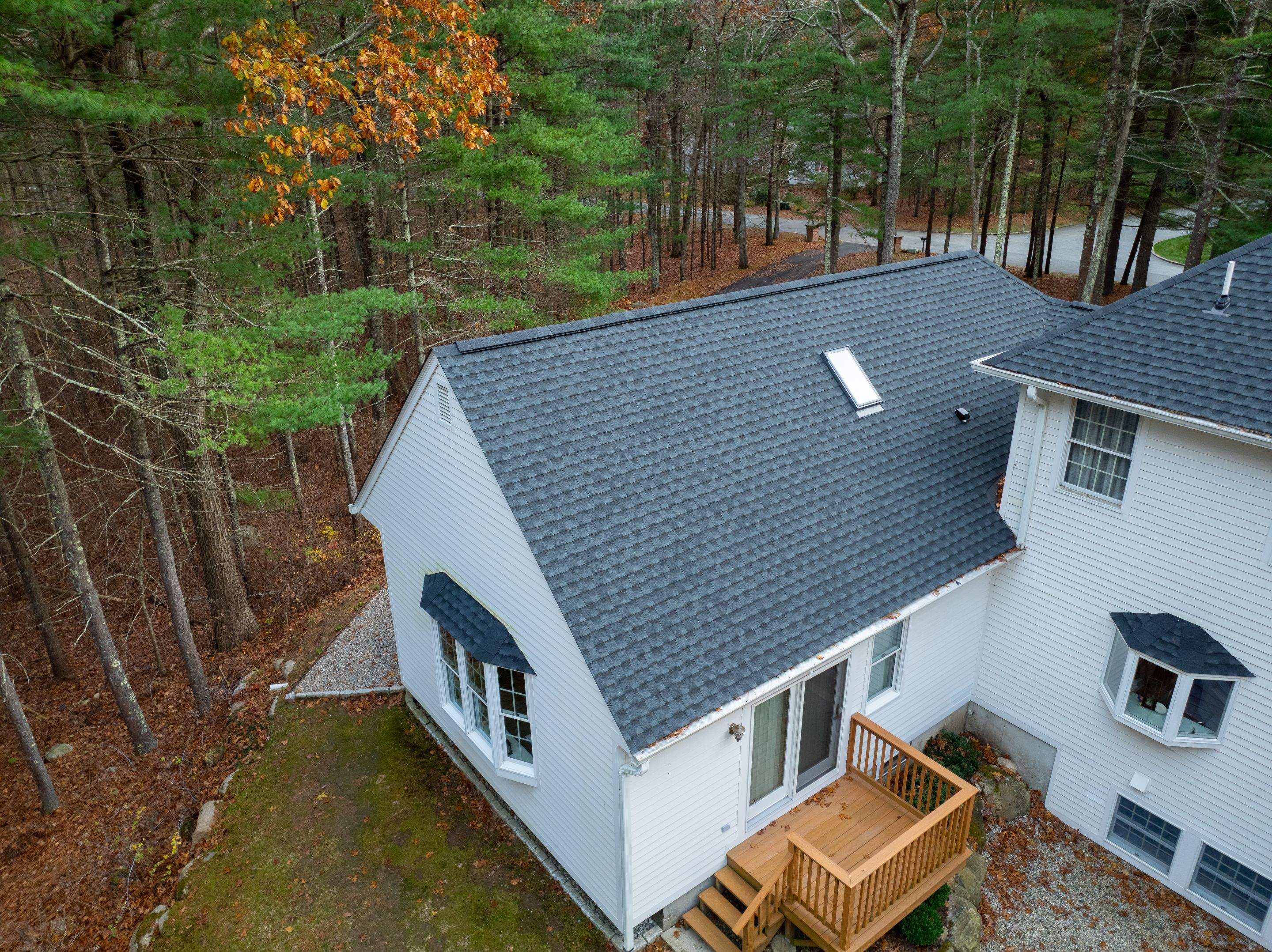 High Hawk - Architectural Shingles, Copper Brick Flashing, Skylights by Rinaldi Brothers