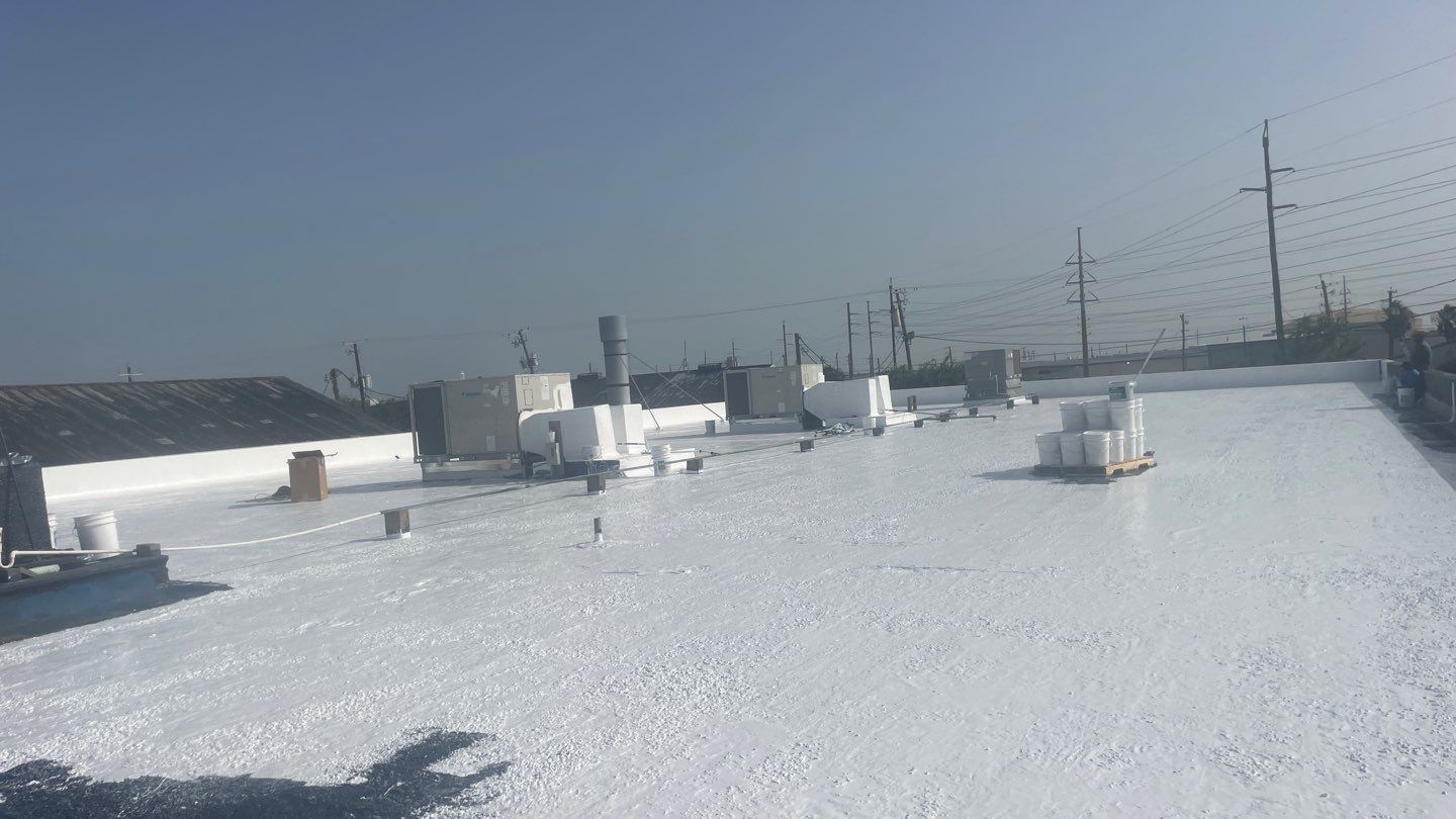 Dirty leaking Gravel Roof by Bayfront Roofing and Construction