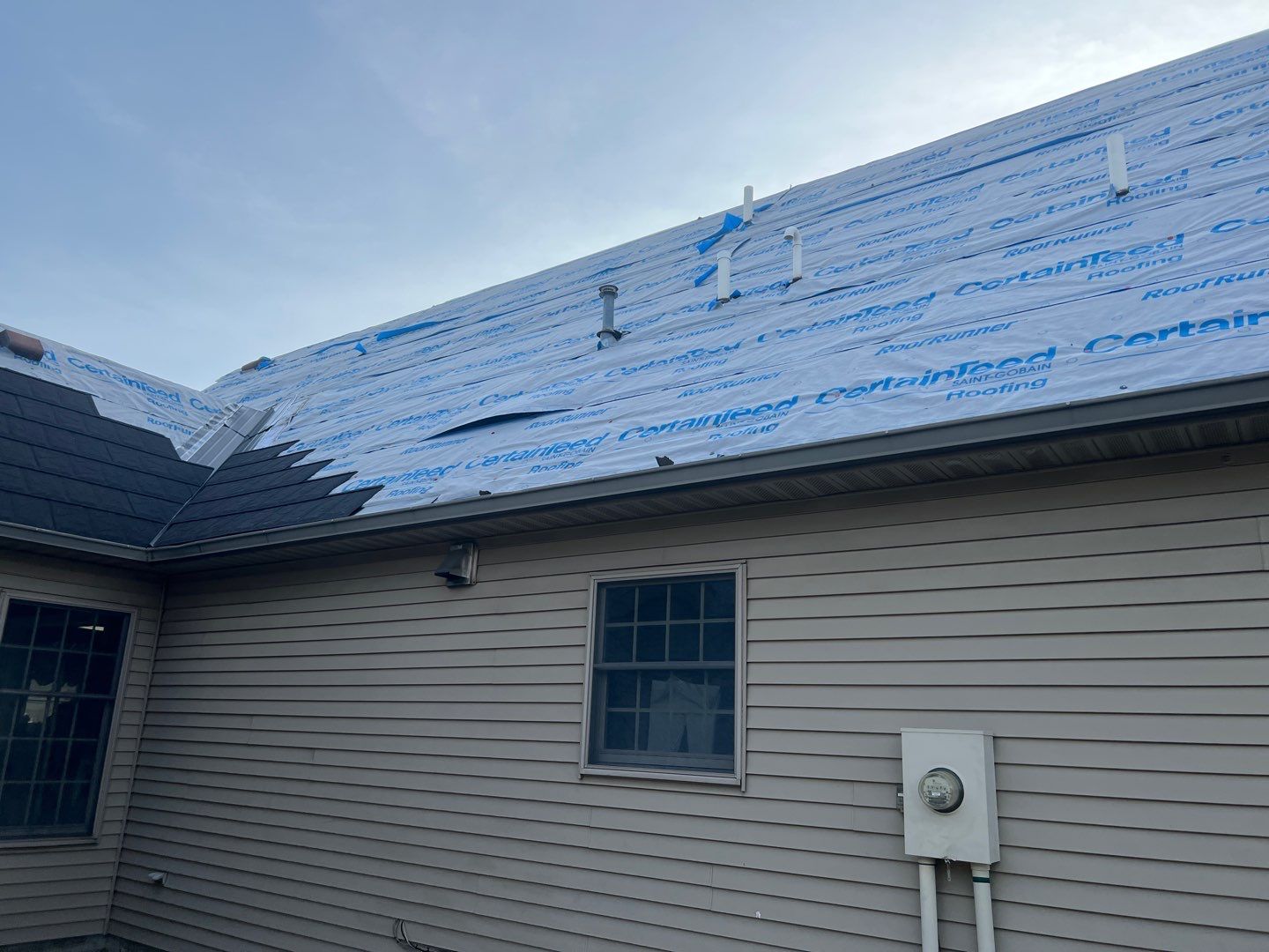 Residential Roofing Repair using Metstar Stone Coated Charcoal by Nitro Roofing and Construction