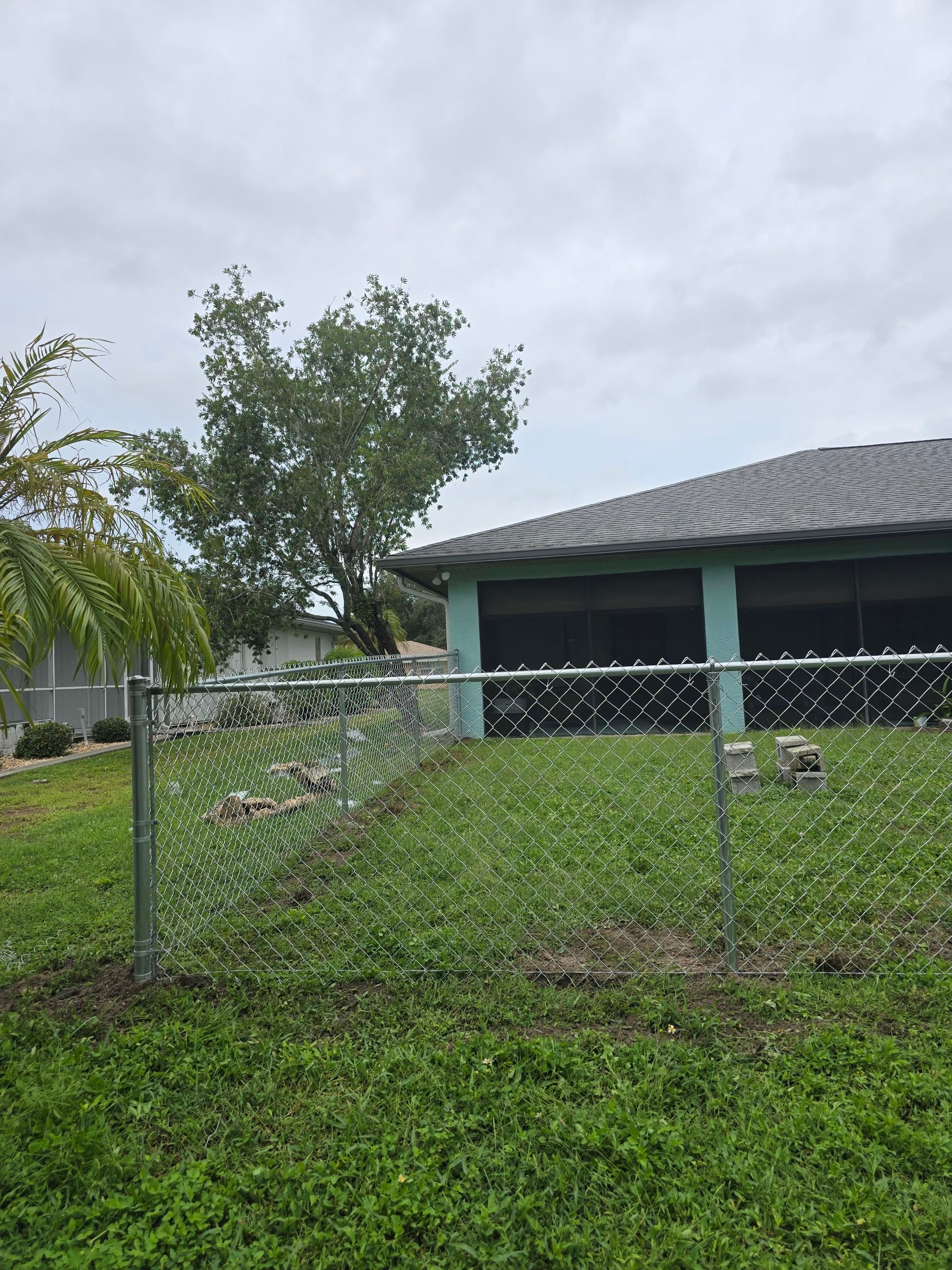 New Galvanized Chain Link Fence and Residential Gate in Port Charlotte by True Fence LLC