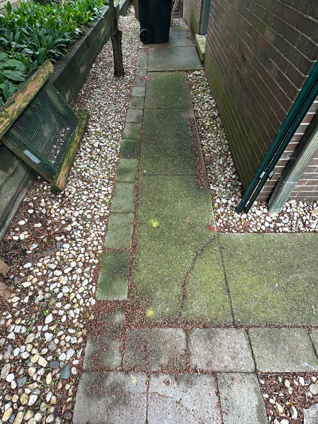 Aggregate and natural stone patio cleaning by Northern Power Washing LLC.