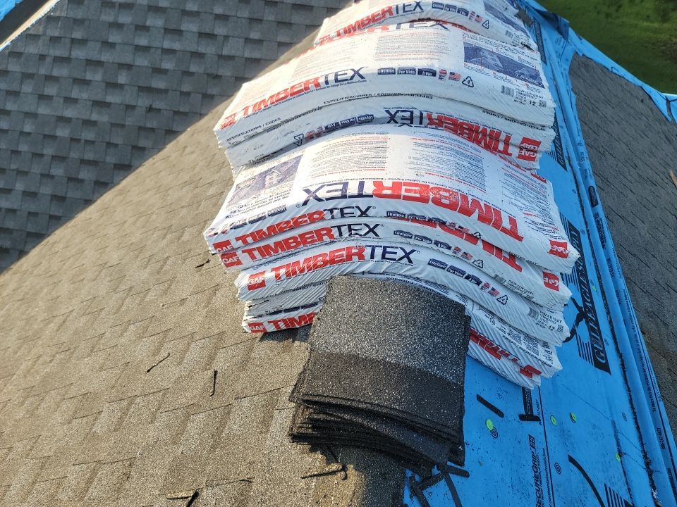 Residential Roofing Installation using Roof Replacement by American Roofing & Construction LLC