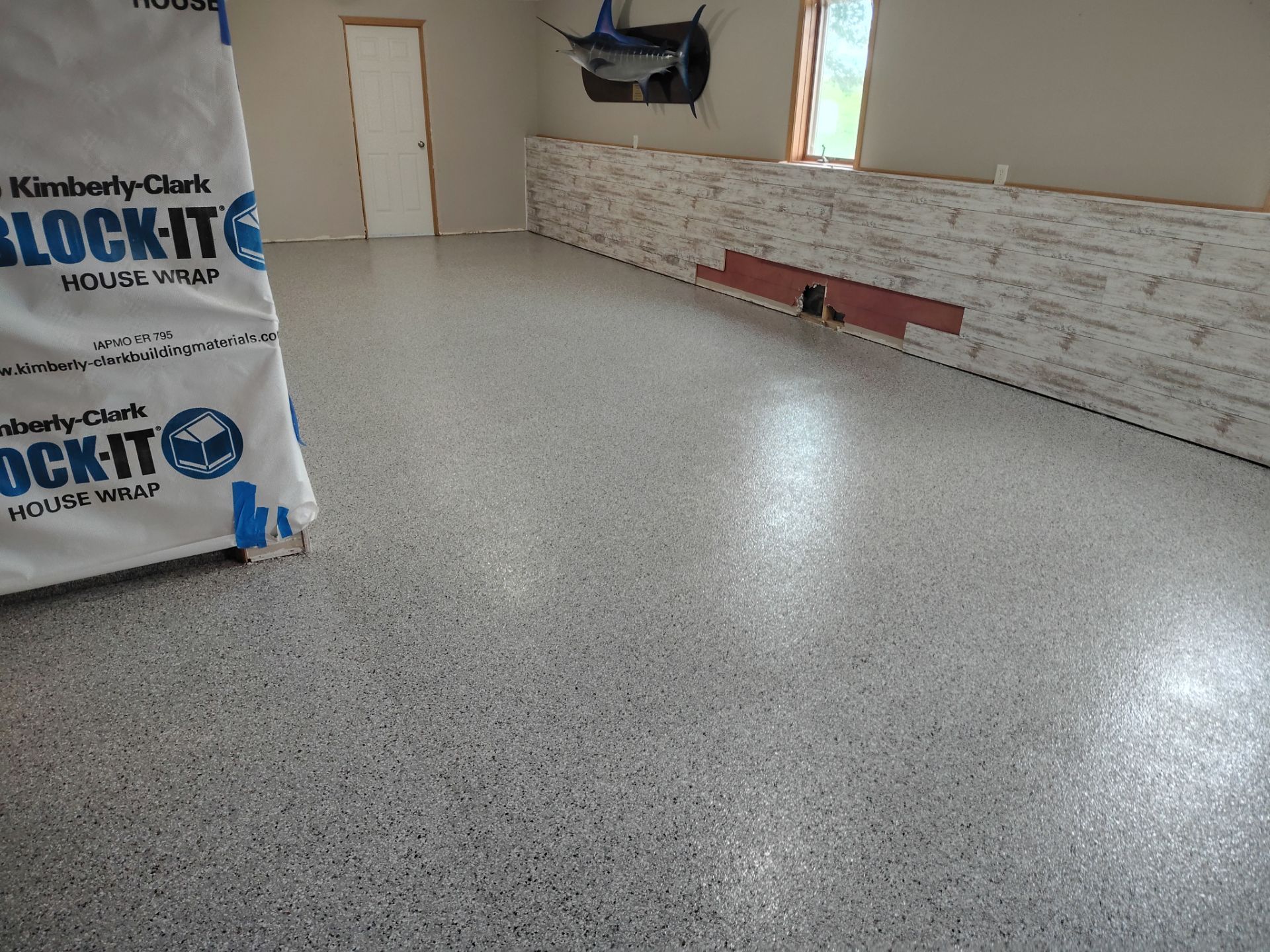 Maxwell, IA Coyote Flake Garage and Basement by Revival Concrete Coatings