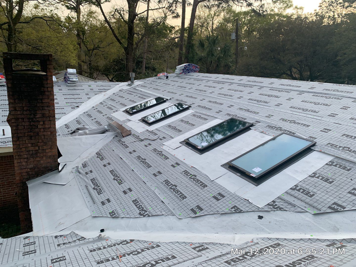 Residential Roofing Installation using Roof Replacement by American Roofing & Construction LLC