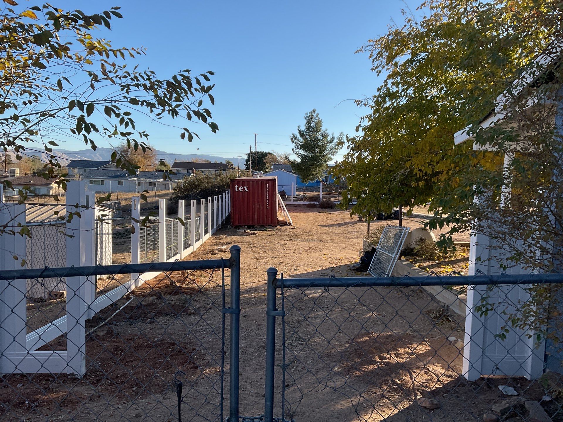 Fence Installation using vinyl and chain link  by Fence Guys Inc. 