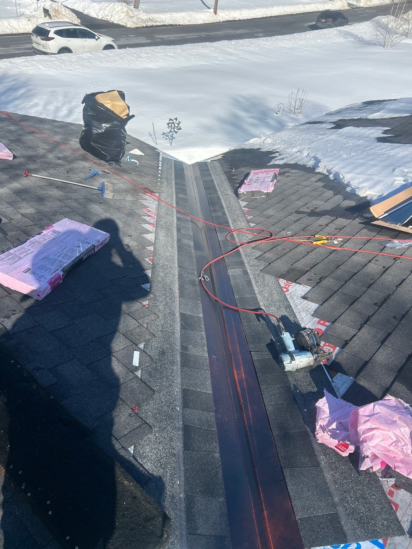 Ridge Cap Replacement & Black Metal Valley Installation in Chelmsford, MA by Mighty Dog Roofing of Greater Middlesex County