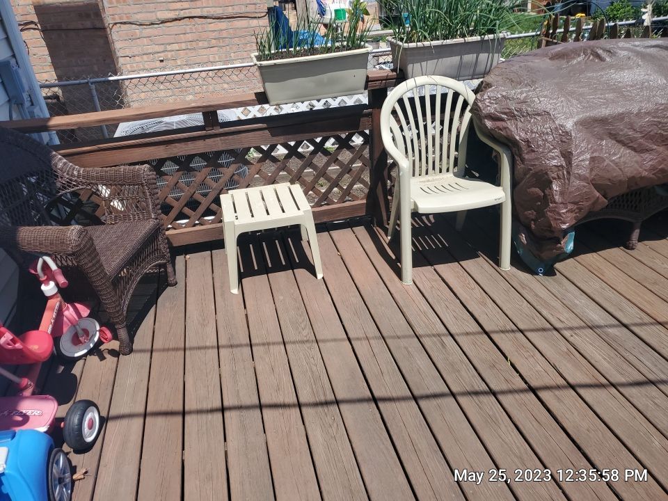 Wood cleaning and staining using Armstrong cloark oil stain by Northern Power Washing LLC.