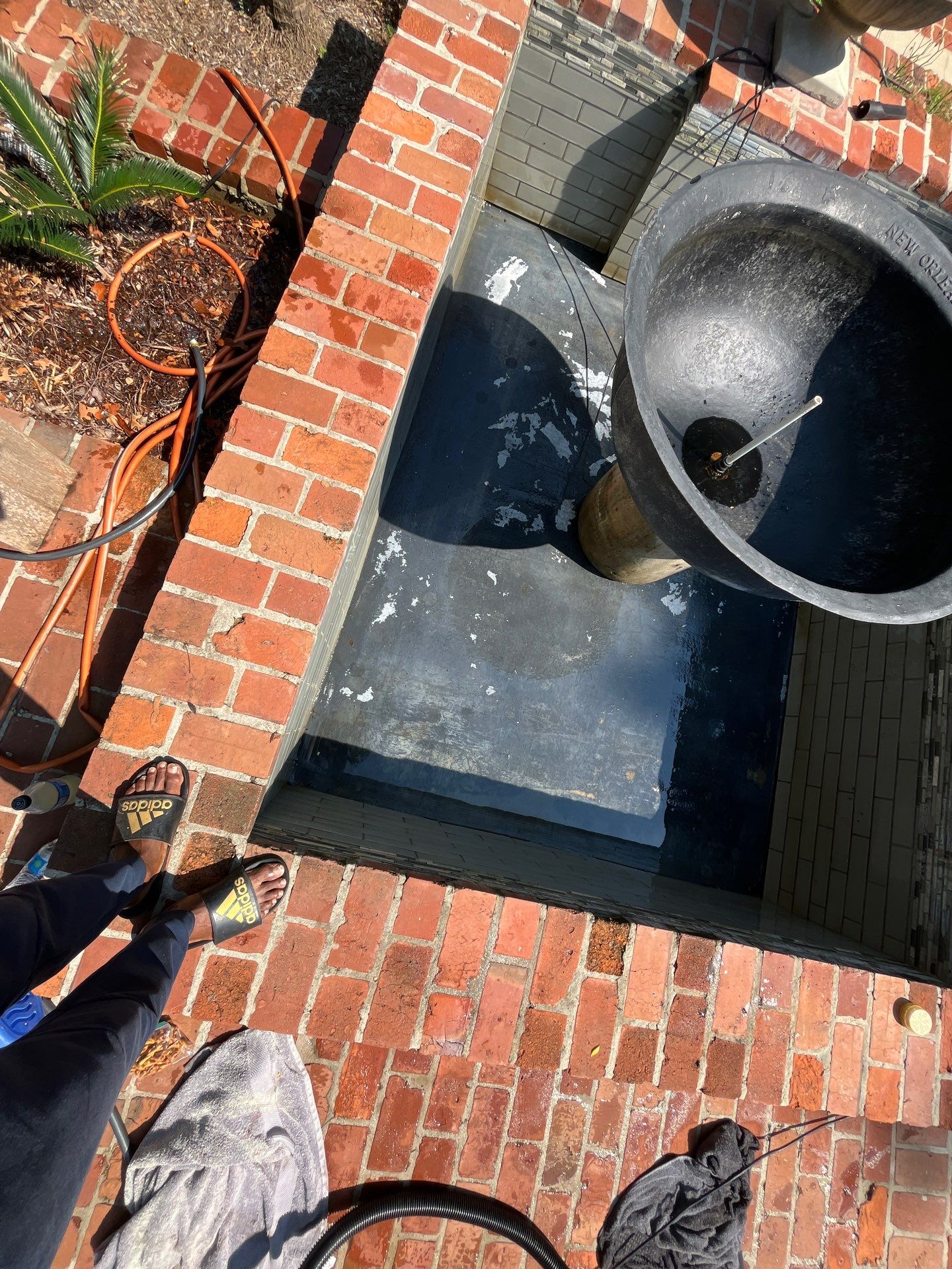 Pool Cleaning using Pool Cleaner by College Bros Outdoor services