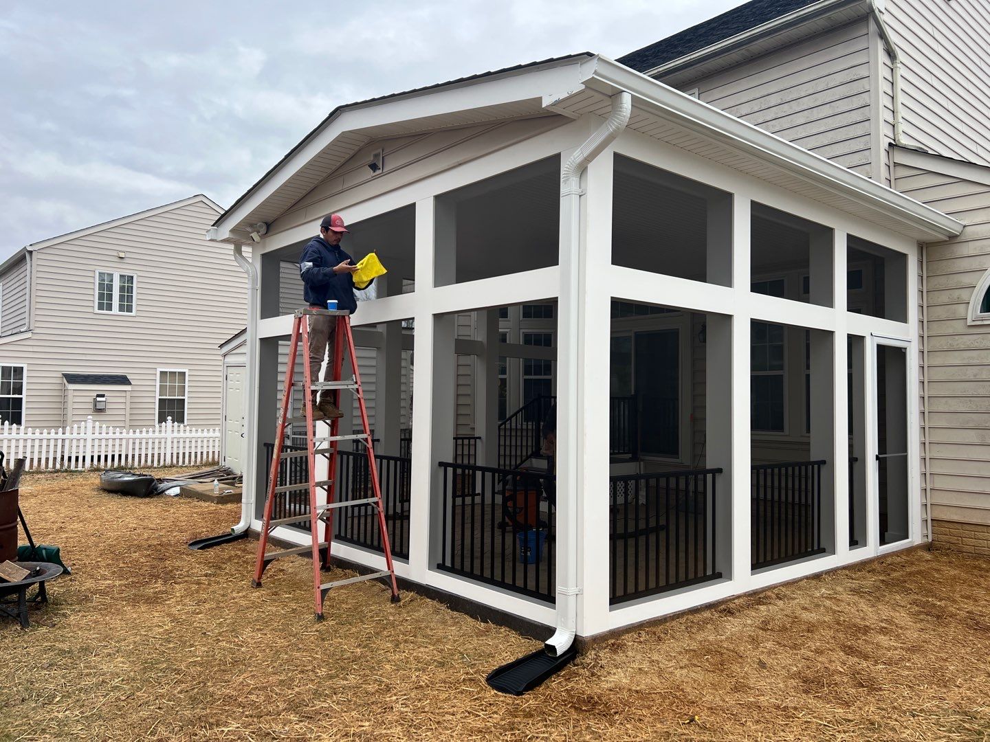 Custom Screened-In Porch with Stamped Concrete Patio in Warrenton by Jakari Restoration & Construction LLC